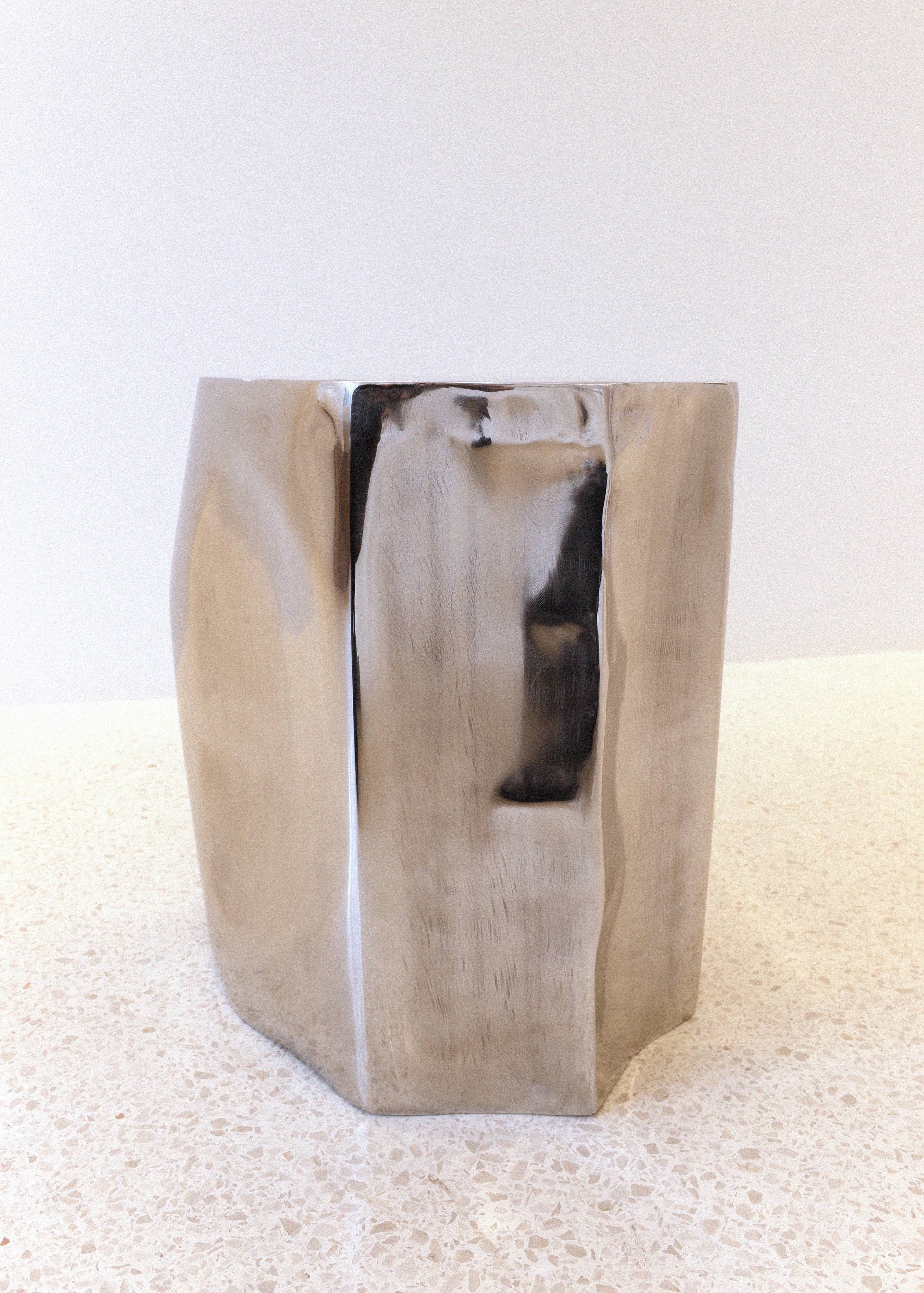 The ROCHER Small Table in Polished Stainless Steel