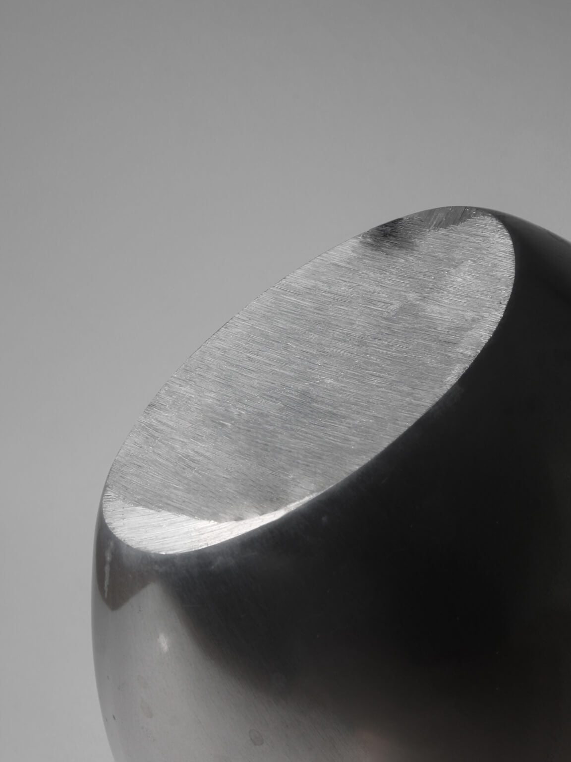 Polished Aluminum Flat Rounded Vase — lifestyle setting