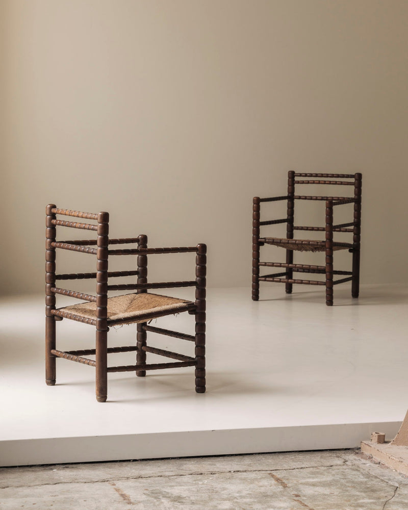 Sculptural French 'Bobbin' armchairs, 1950s — detail view