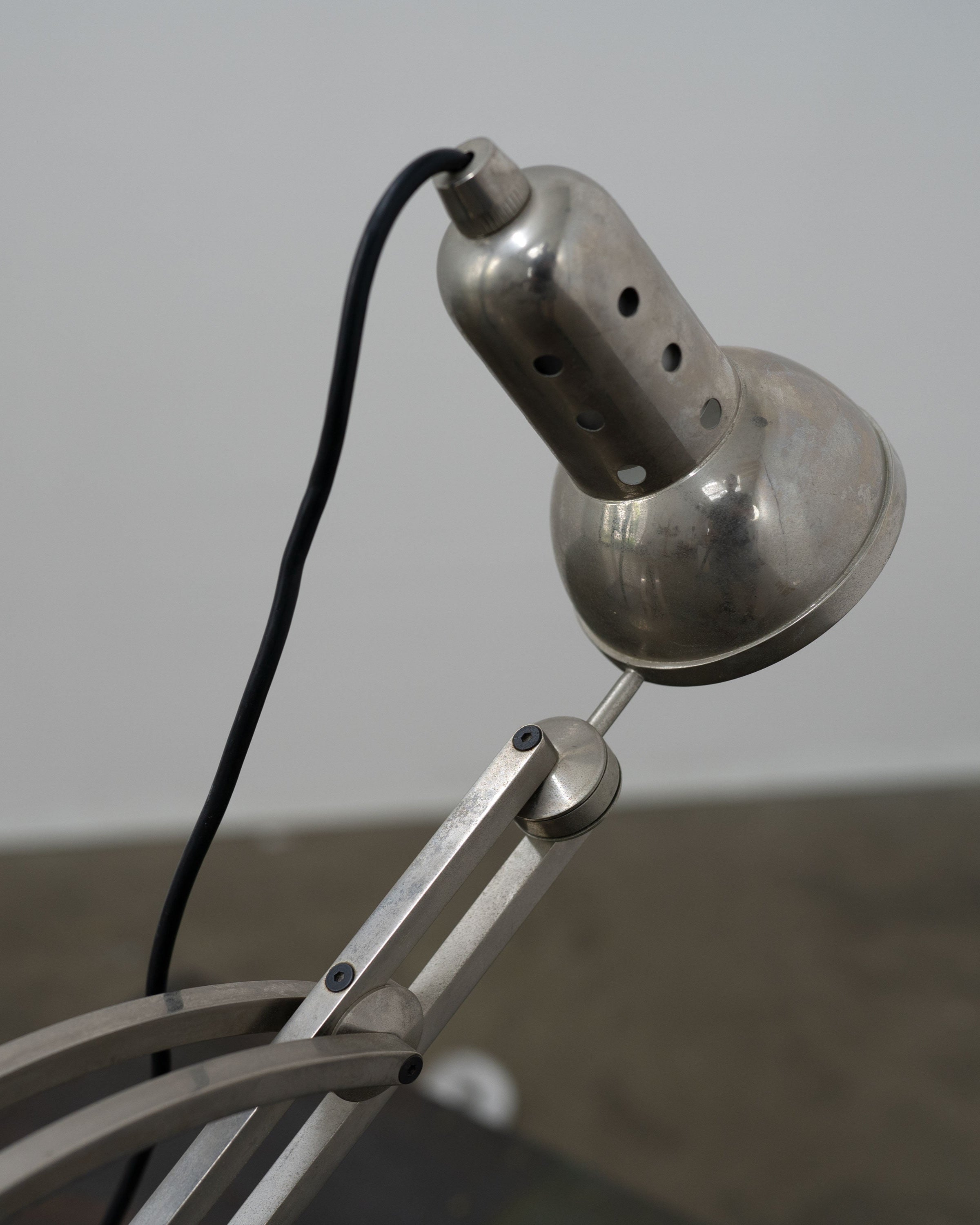 Adjustable articulated arm detail of Art Deco table lamp