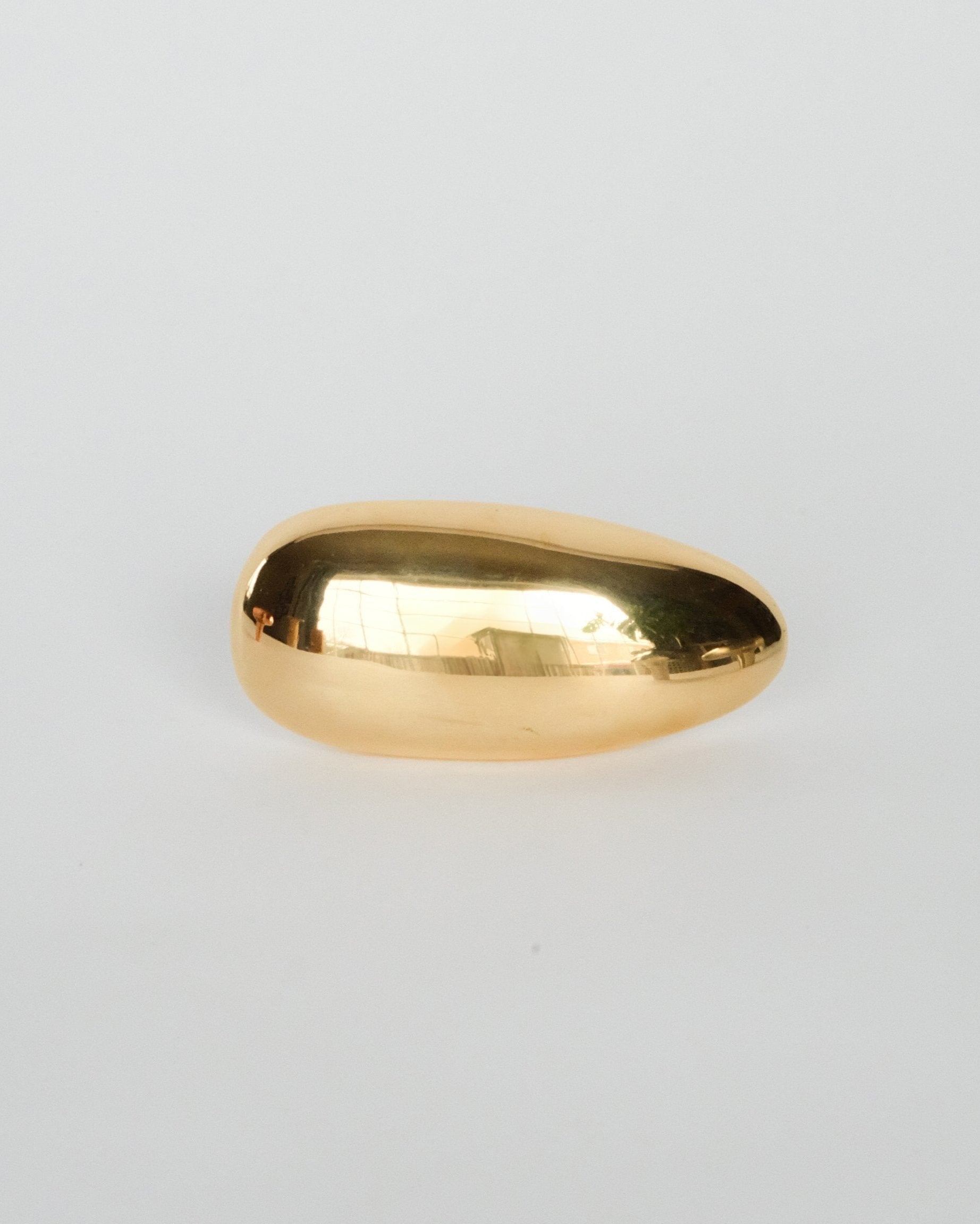 MOMI Knob/Hook Long — close-up of polished gold surface