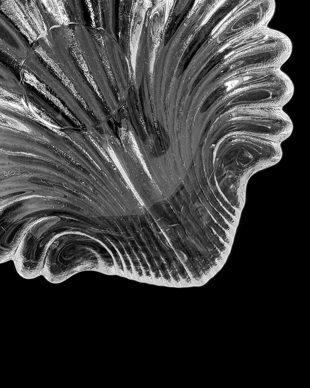A vintage glass shell dish — detail view