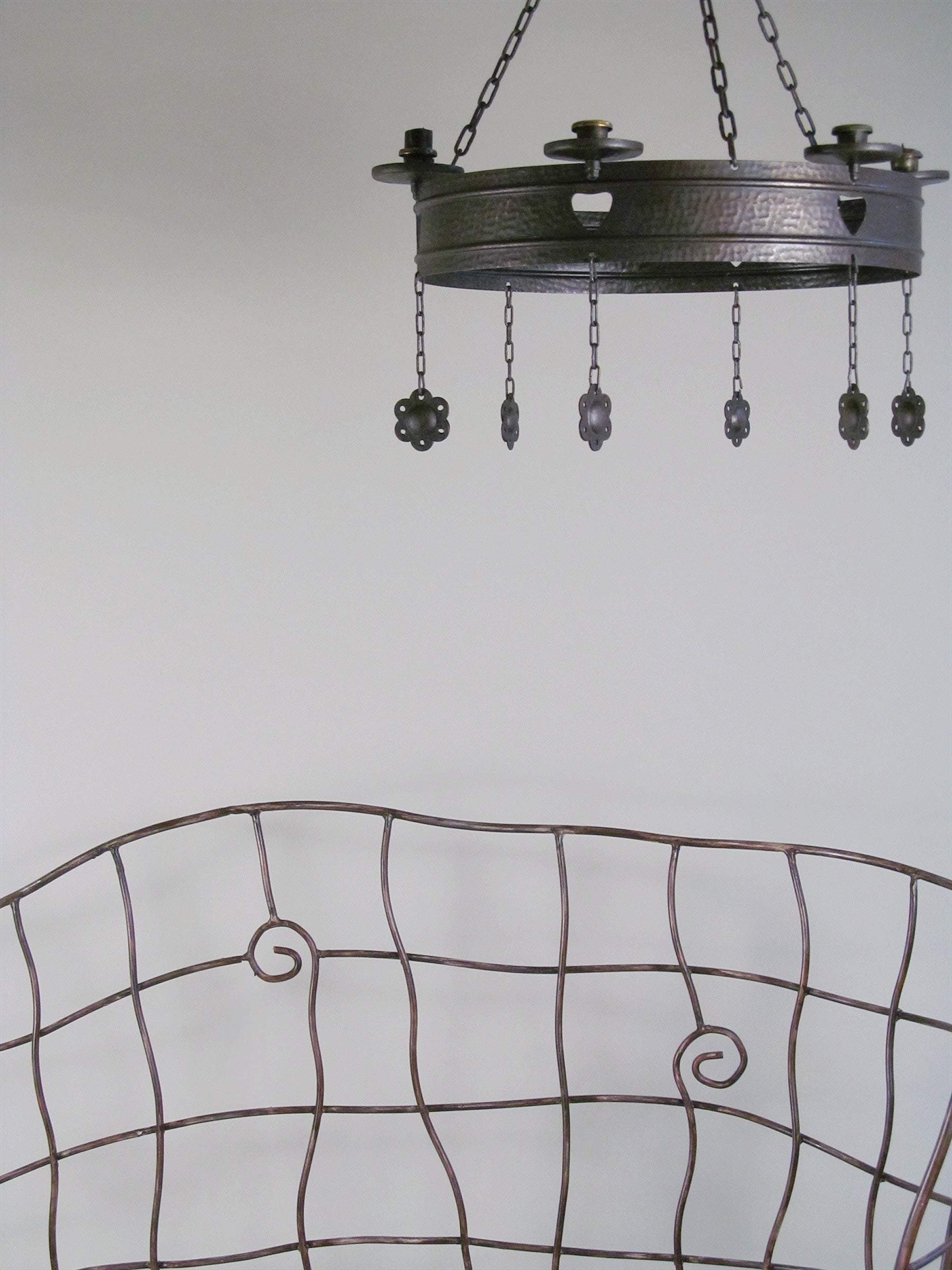 Scrollwork Iron Bench — side angle showing wrought iron design