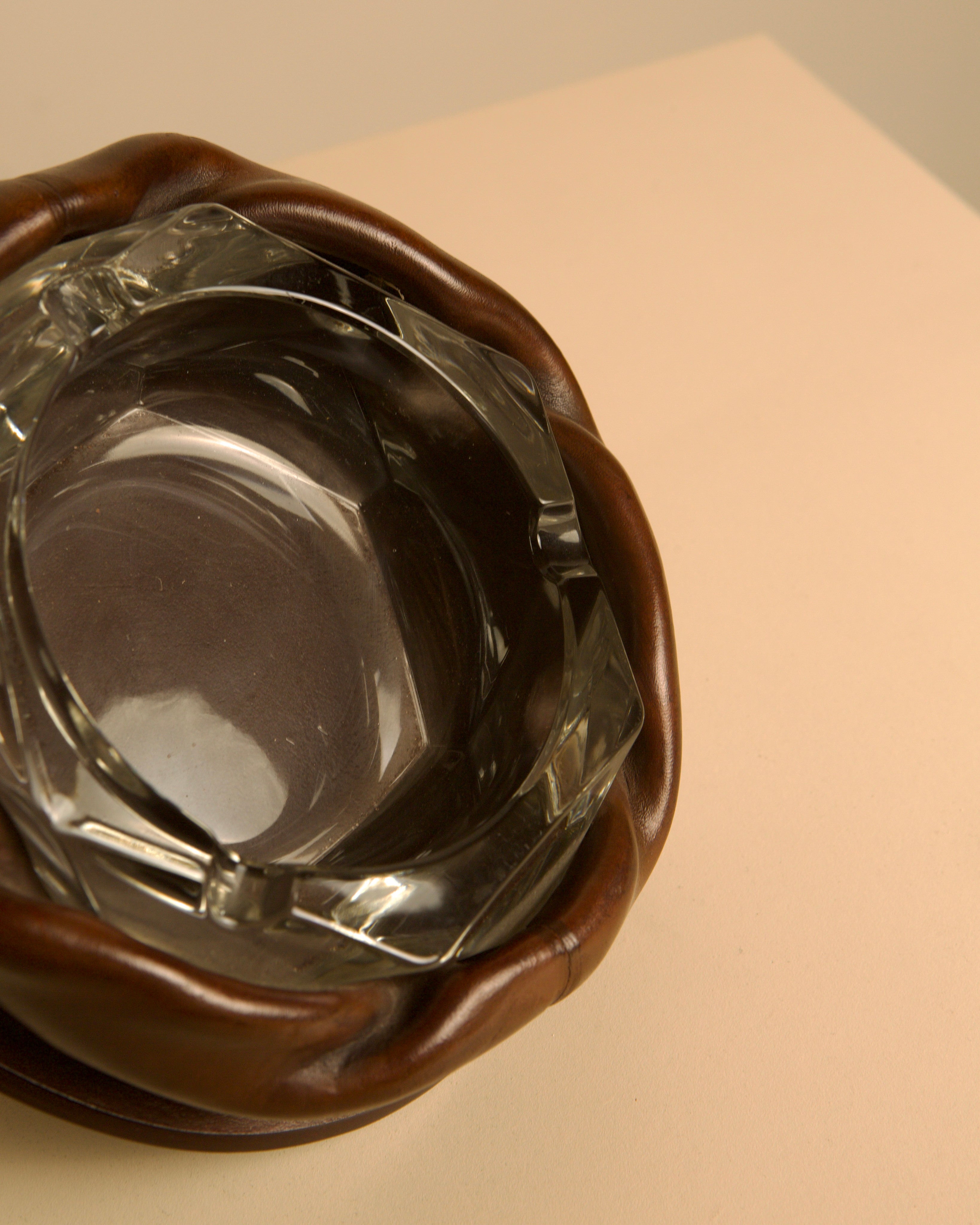 Italian Octagonal Glass Ashtray with Brown Leather Trim, 1960s — angled view on neutral background