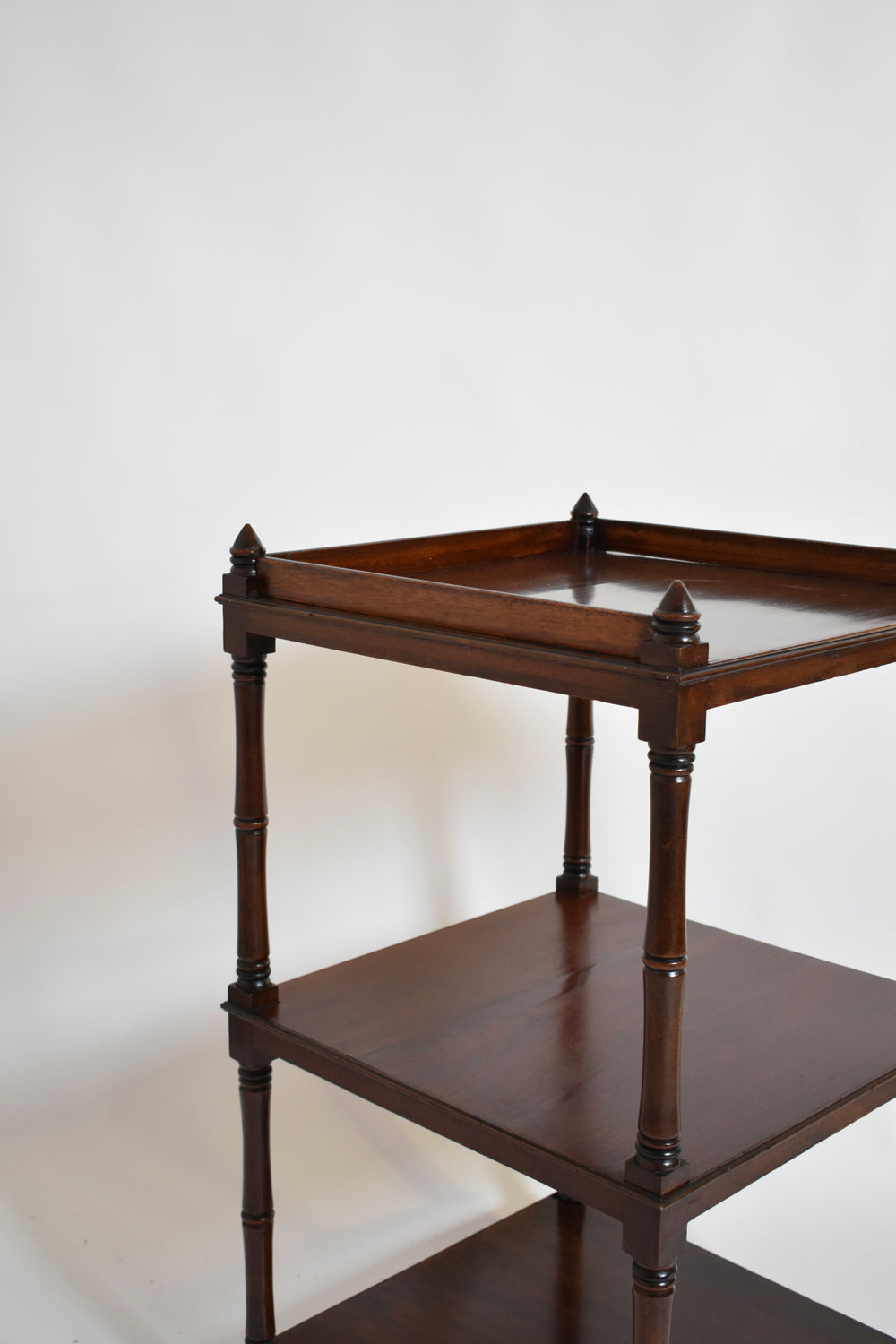 Faux Bamboo Bookshelves Pedestal Table, 1960s — angled view highlighting wooden shelves
