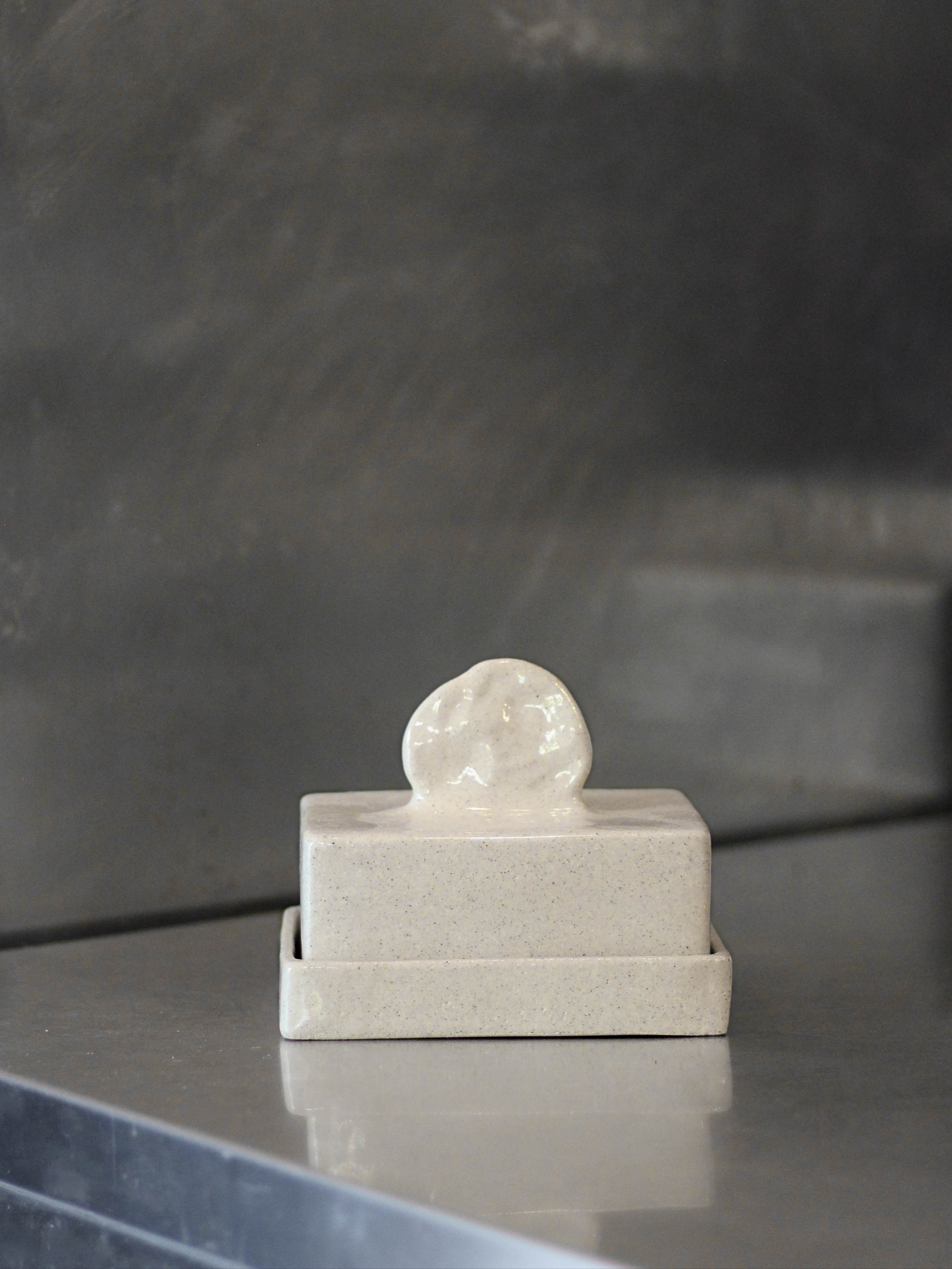 Stoneware butterdish — detail view