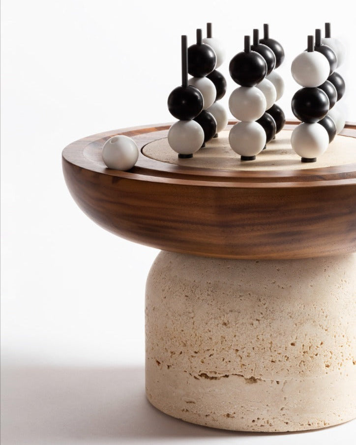 Mocambo tic-tac-toe game detail on travertine pedestal base