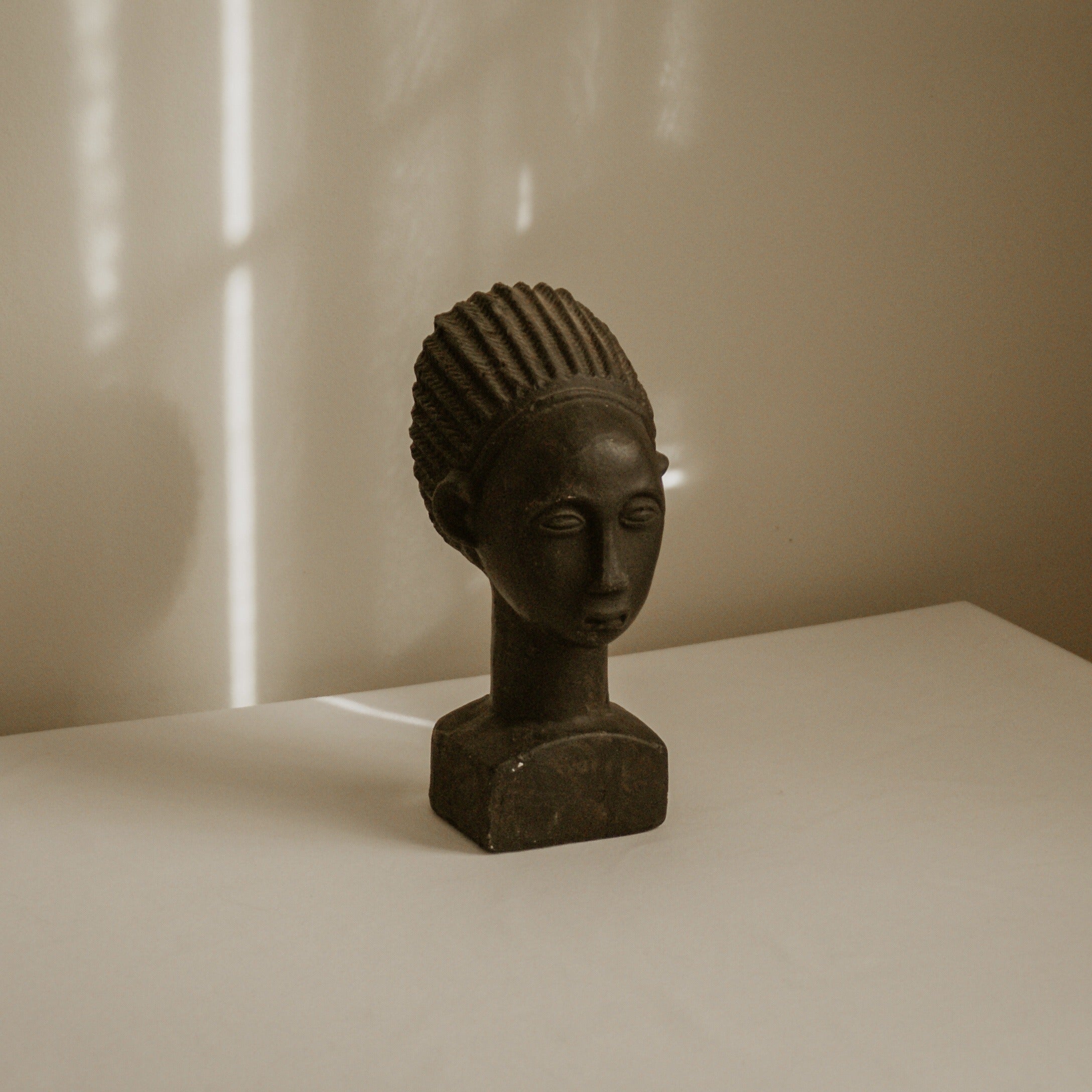 African Terracotta Bust — side angle