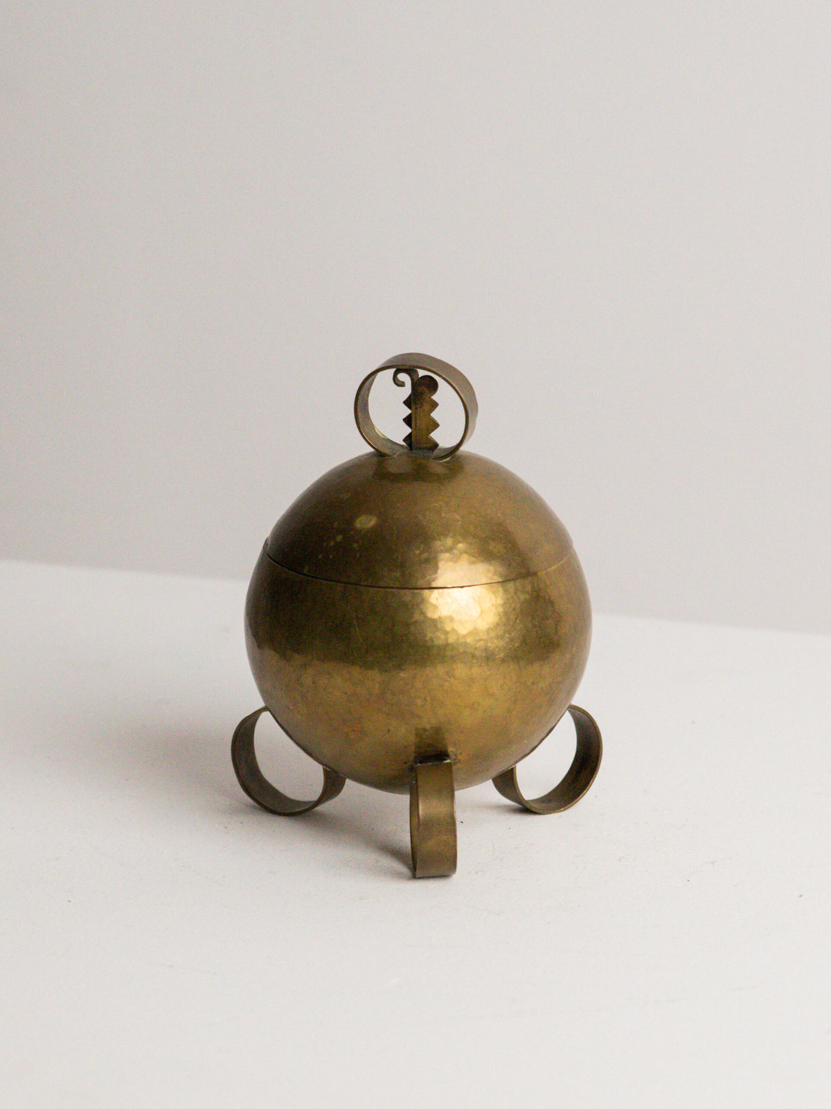 Hand Raised Brass Sphere Box with Toothed Zigzag Finial, Art Deco Style, Central European Workshop, circa 1930s — close-up