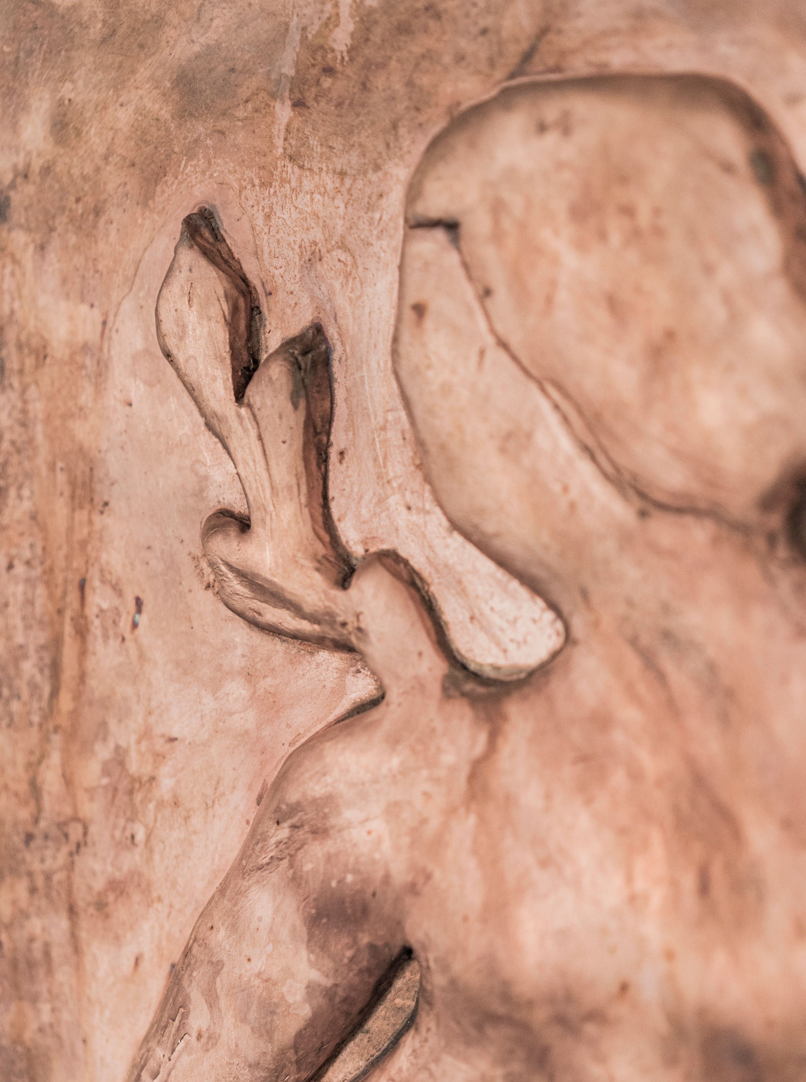 Woman with Laurel Leaves' Chikanka — side angle highlighting textured clay surface