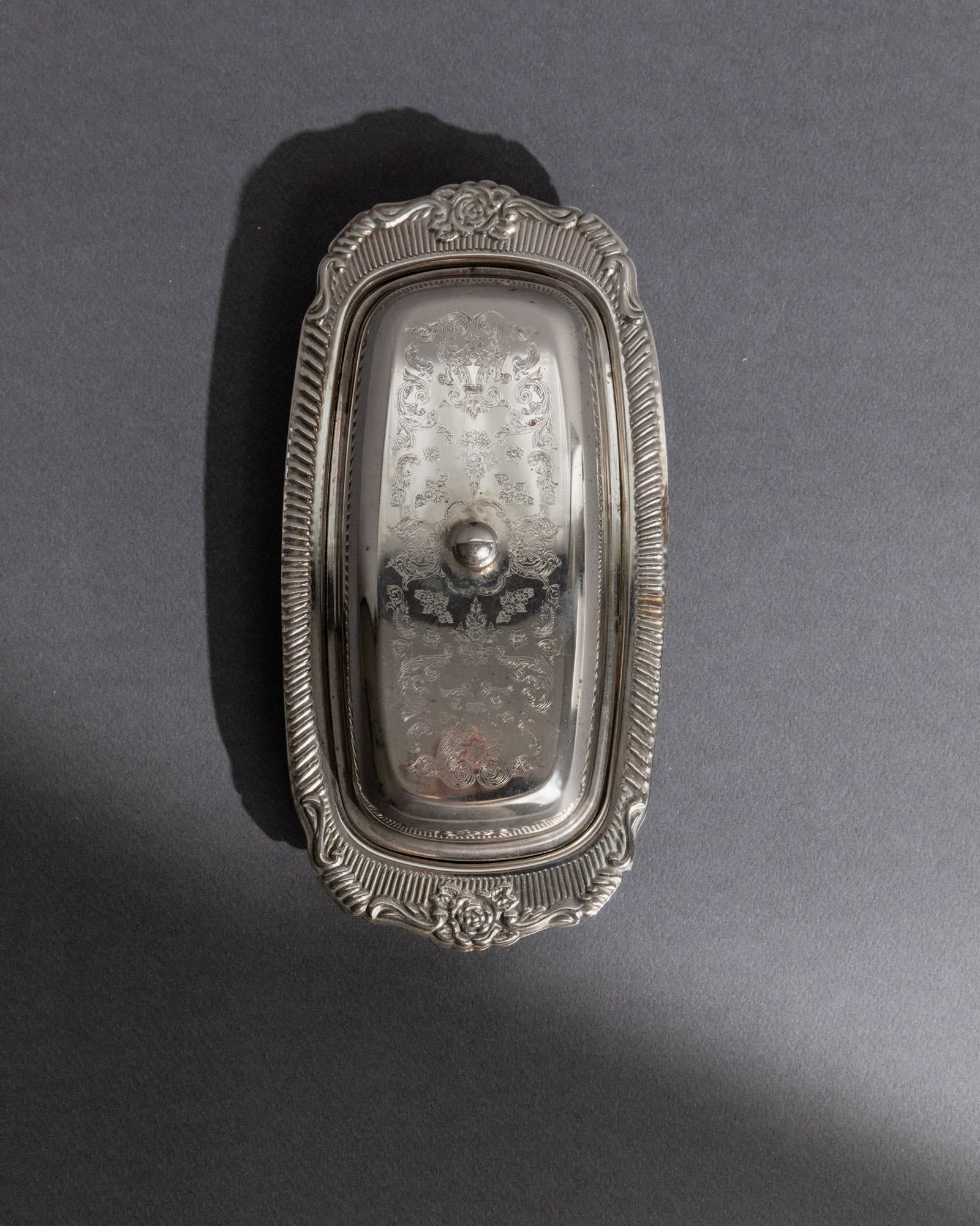 Previous slide Next slide Vintage 1970s Silver Plated Butter Dish, Engraved Ornamental — top view showing intricate engraved