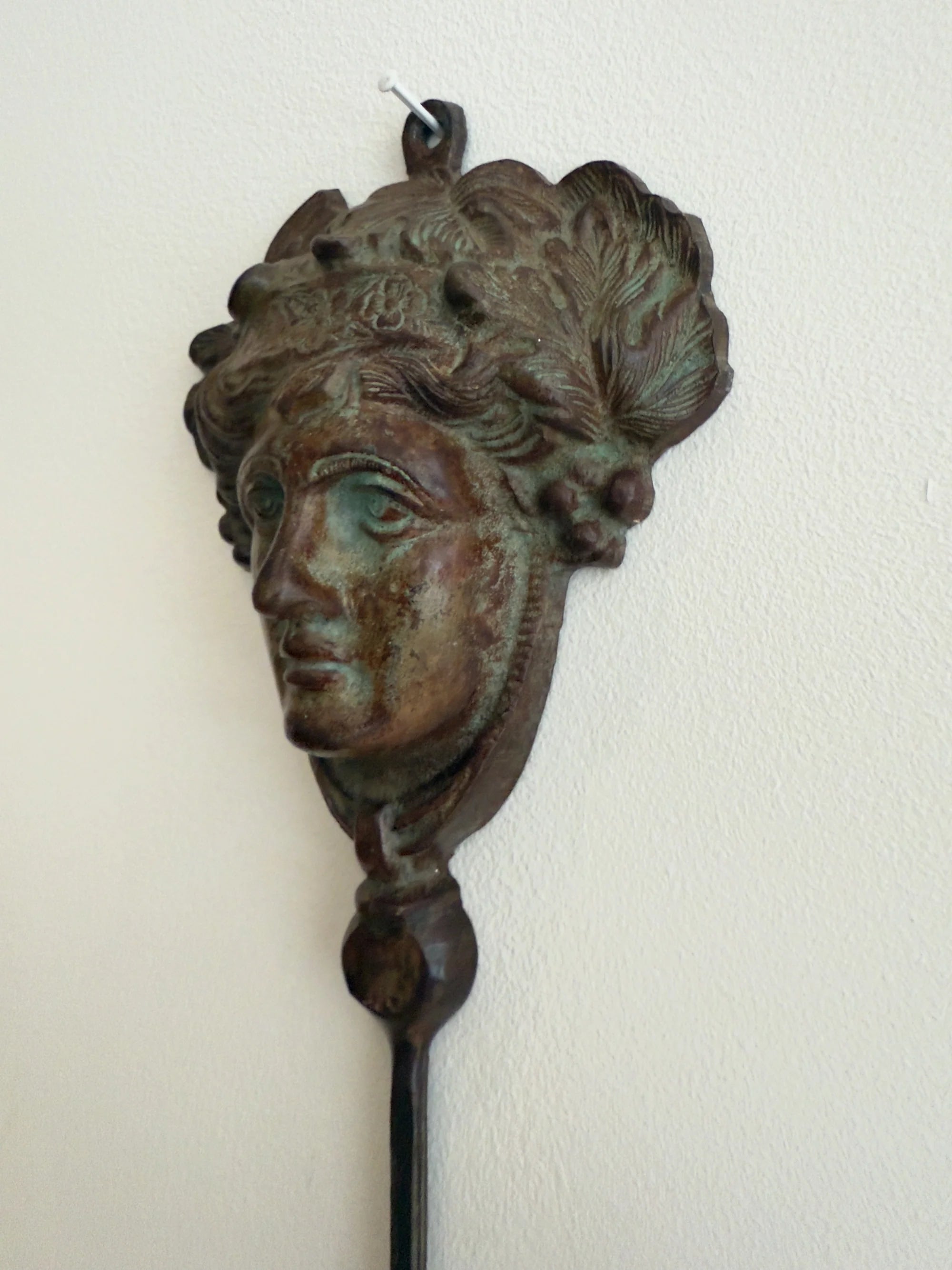 Neoclassical Bronze Candle Sconce — side angle showing detailed face design