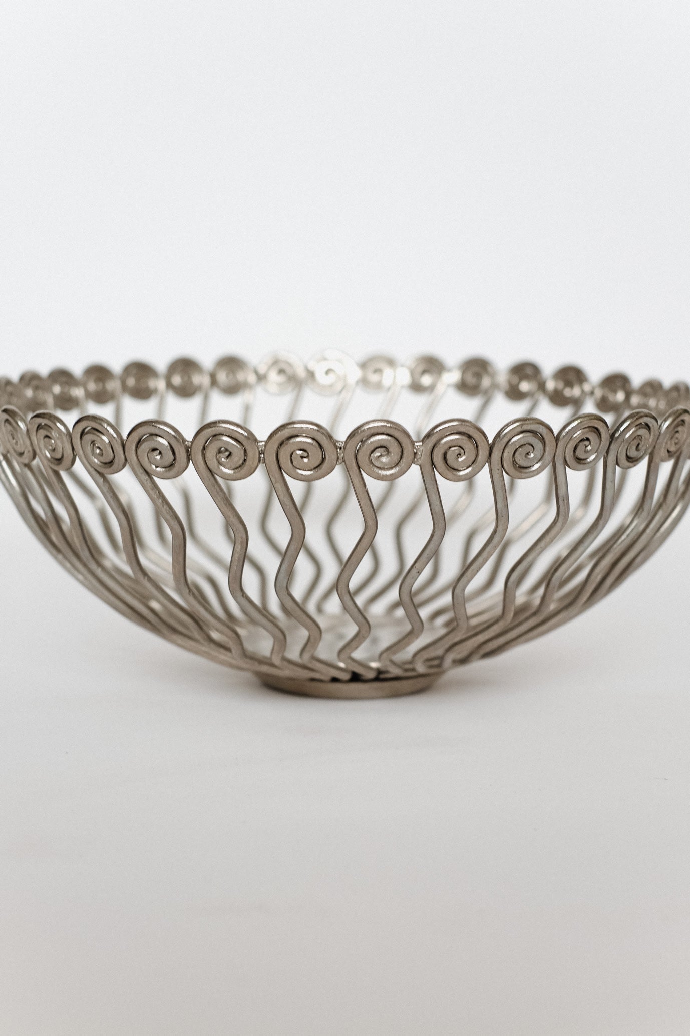 Large Decorative Bowl — back view of twisted metal design