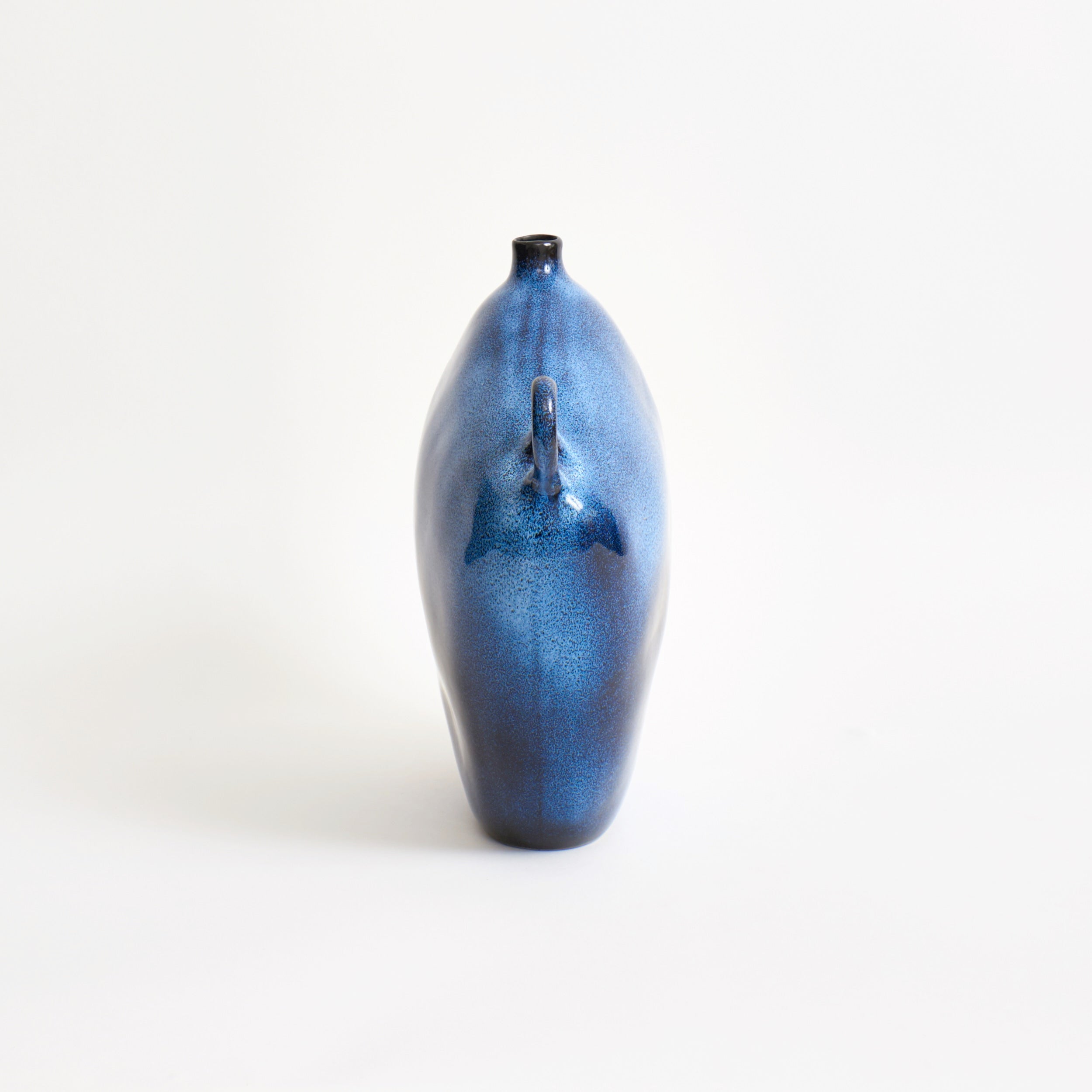 Maria Vessel - Oat — back view highlighting glossy ceramic finish