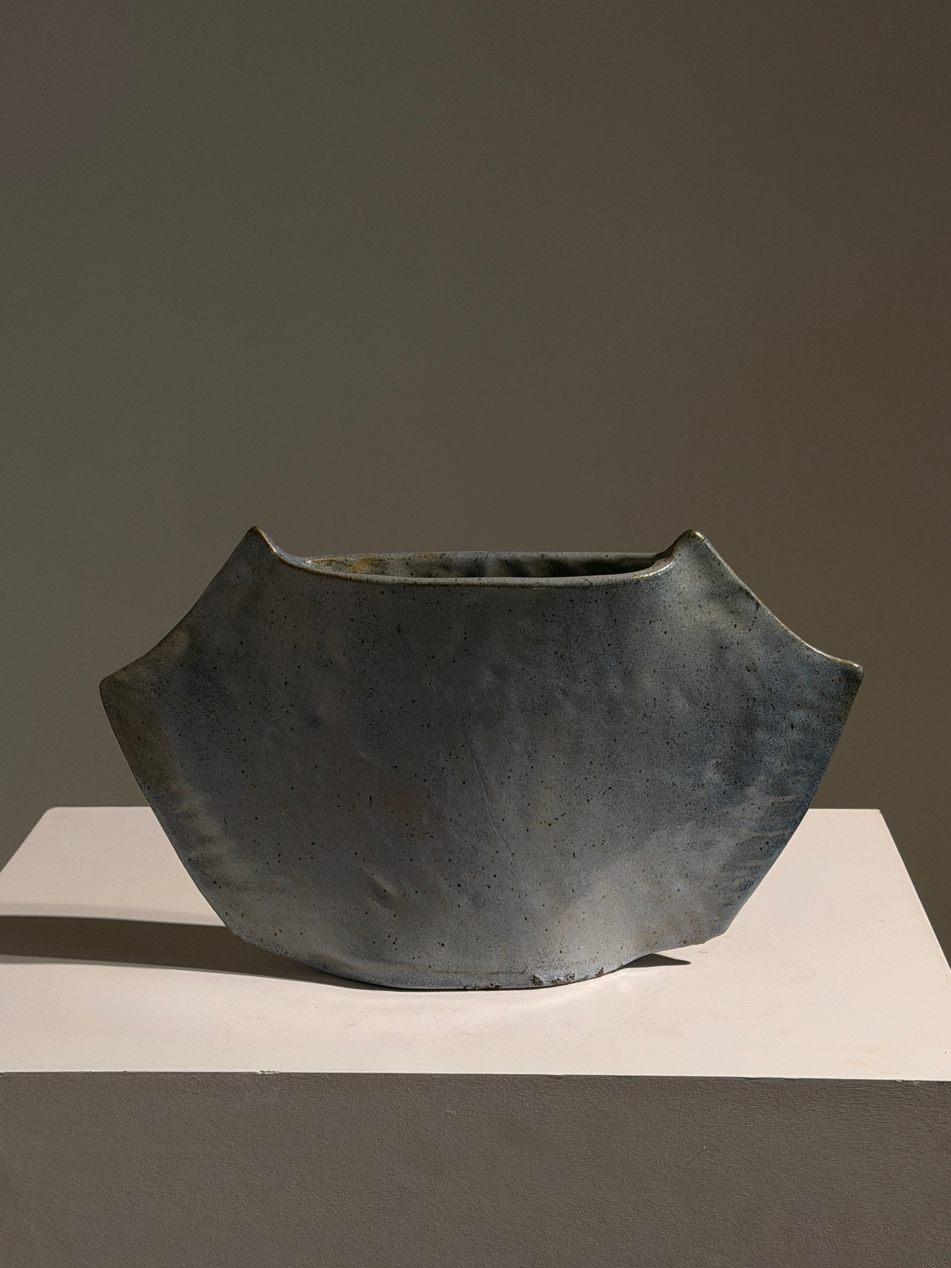 Free-form vase in blue-grey glazed ceramic, France, circa 1970.  — detail view