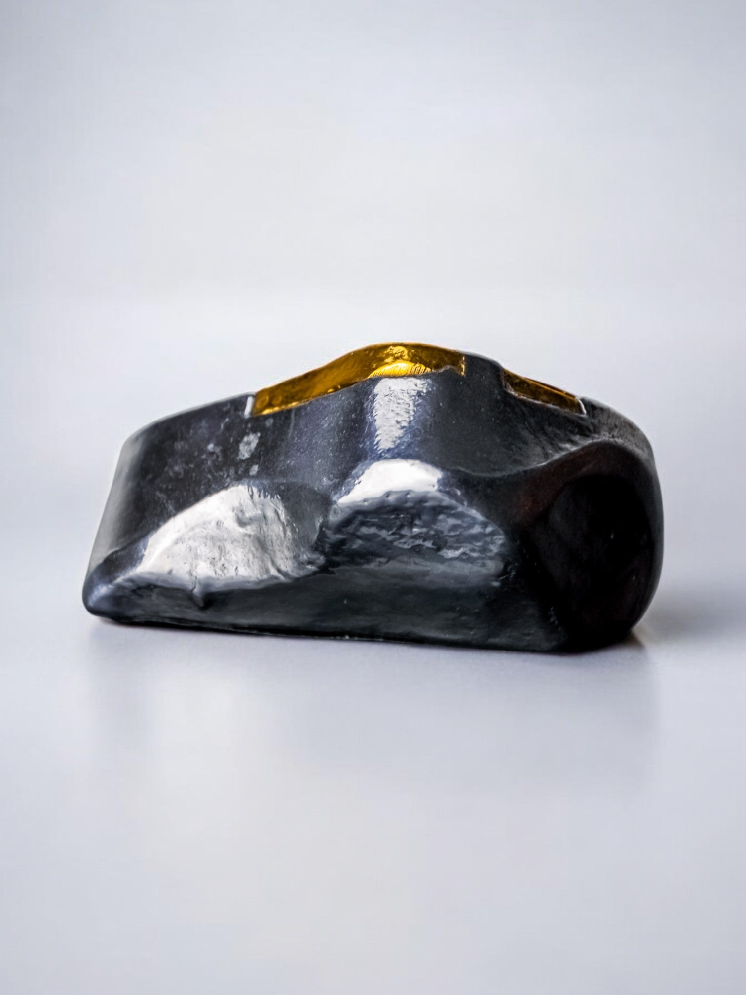 Brutalist Clock by Art3, Spain, 1980s — angled view highlighting black and gold finish