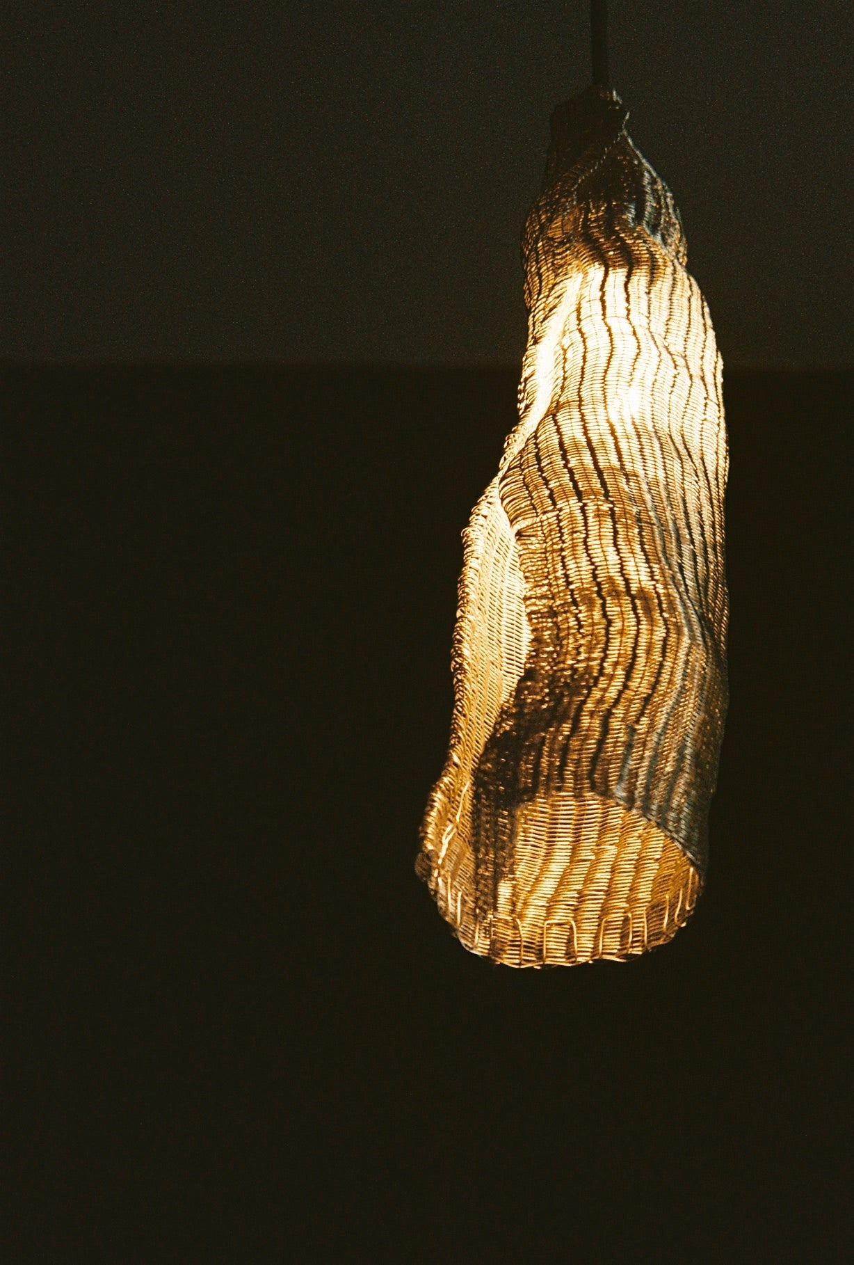 Draia Aluminium Pendant — side angle showing textured metallic surface