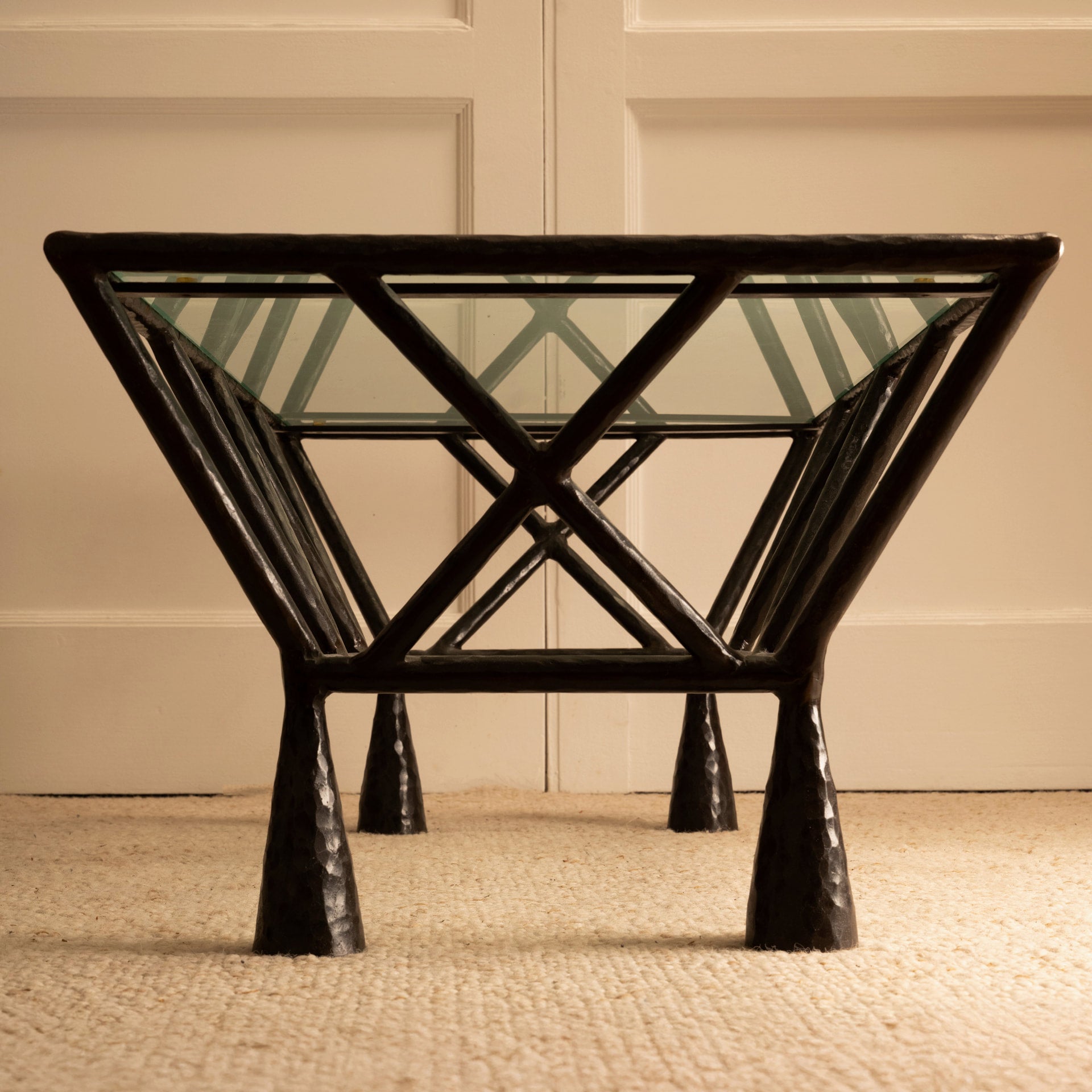 Zebra Coffee Table — front view with glass top and black legs