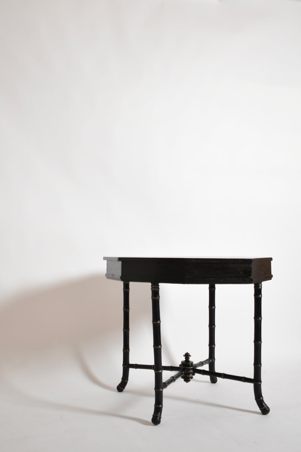 Faux Bamboo Octogonal Table, 1910s — side angle showing black finish and legs