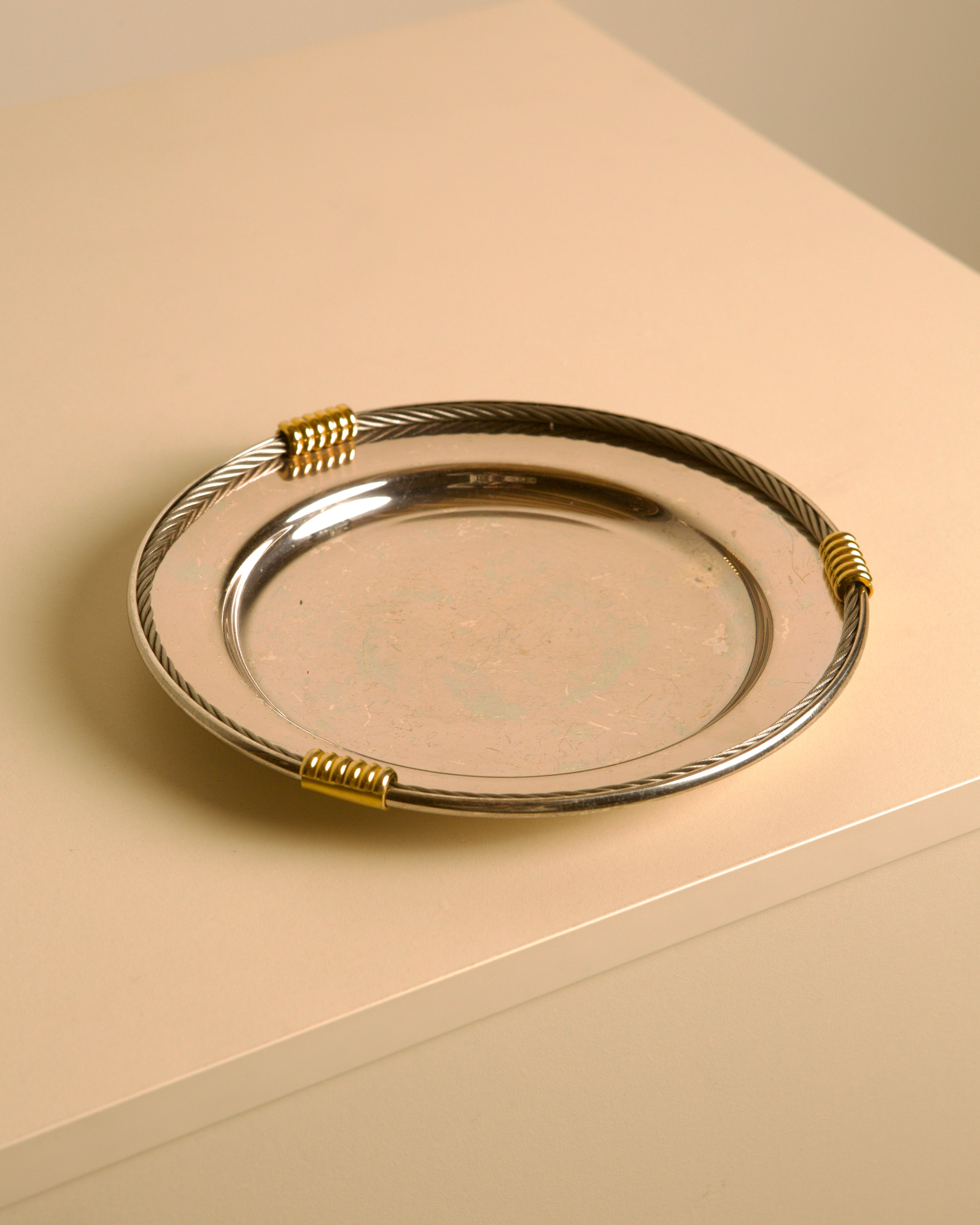 Silver-plated and Brass Vide-poche by Fred, 1970s — side angle on neutral surface