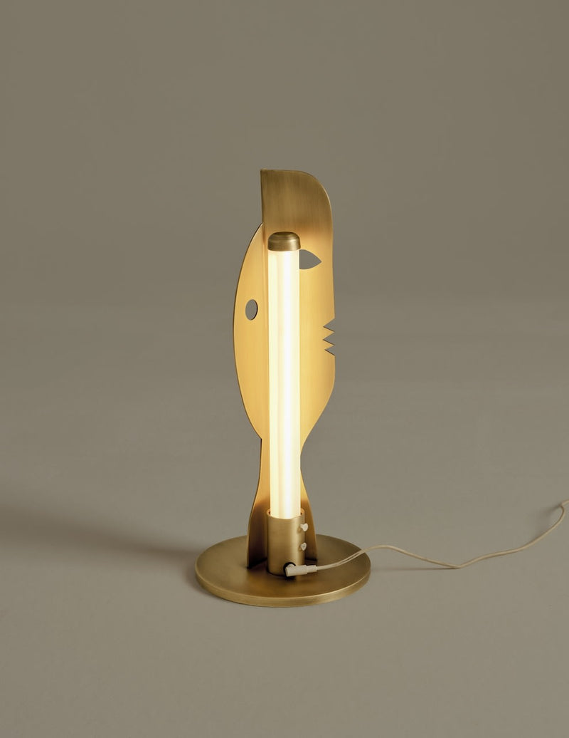 Deramo Lamp — close-up of brass body with light tube