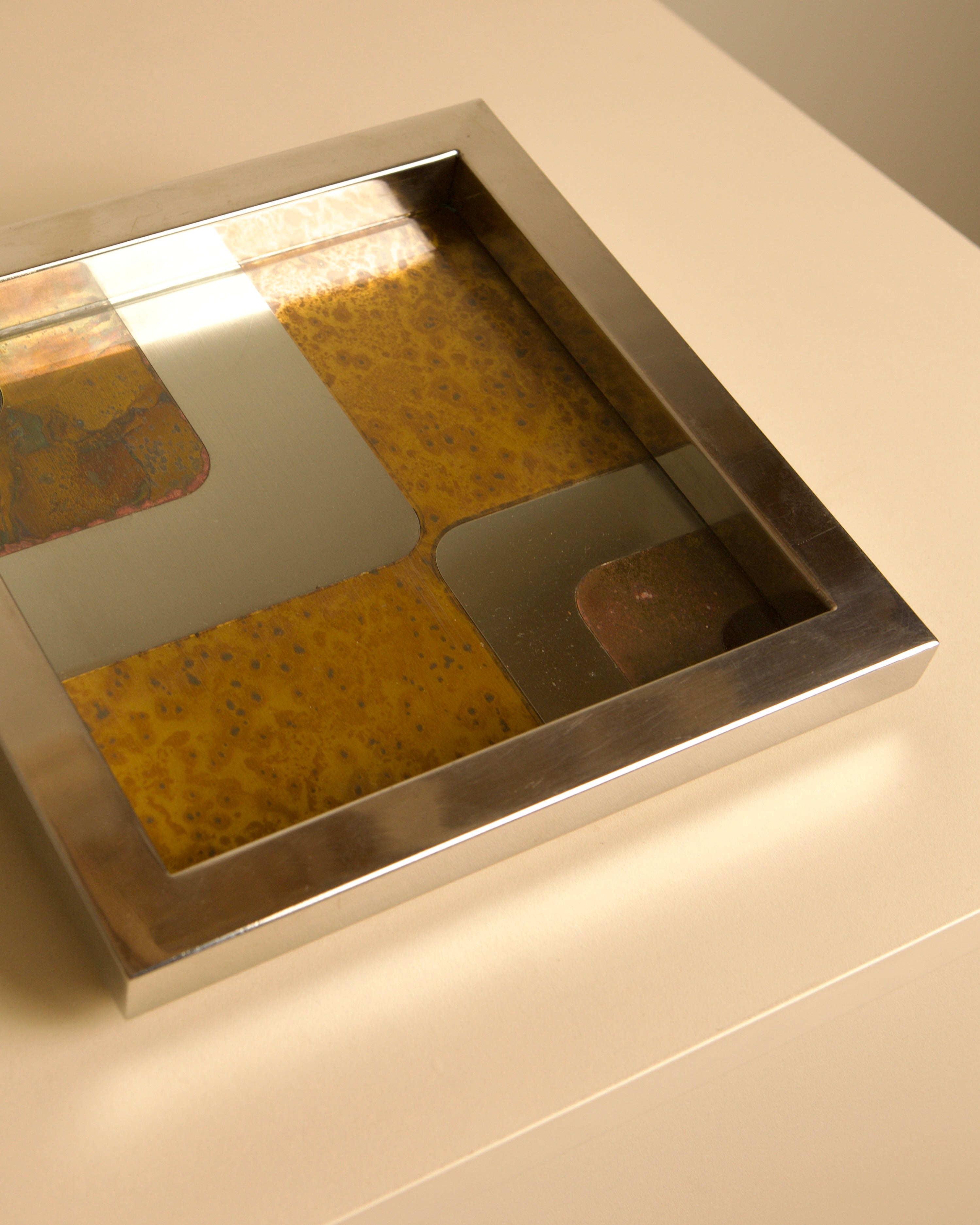 Italian square metal, glass, wood-effect and 70s patina catchall — lifestyle setting