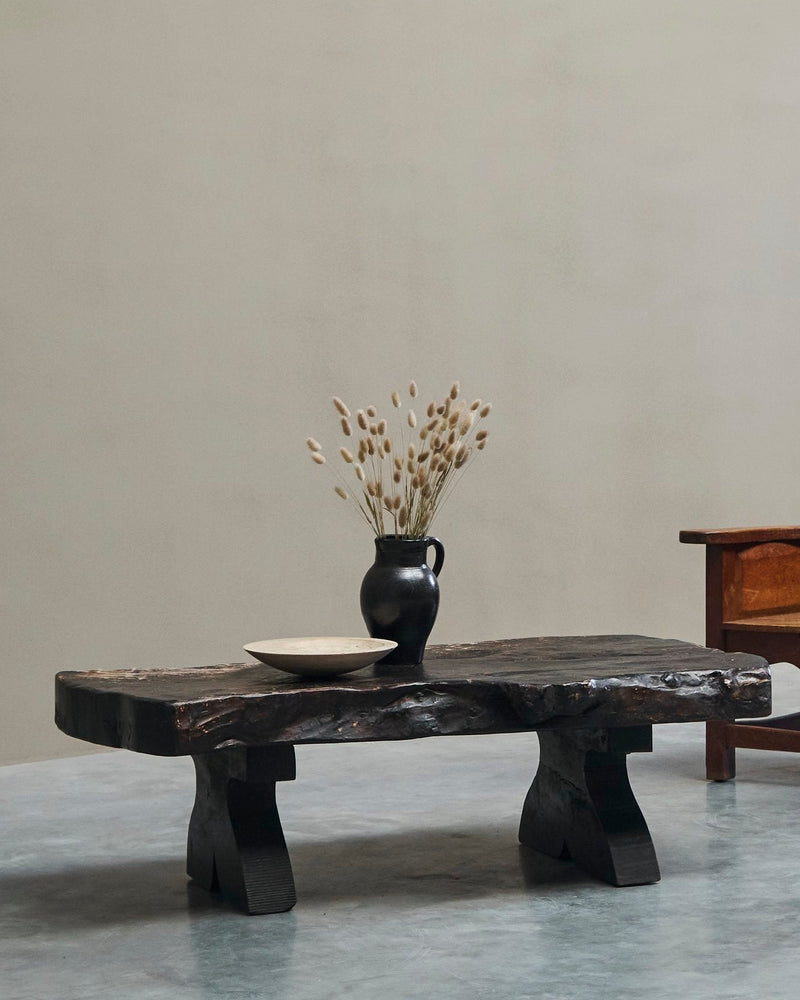 Sculptural Live Edge Coffee Table in Solid Dark Stained Wood — detail view