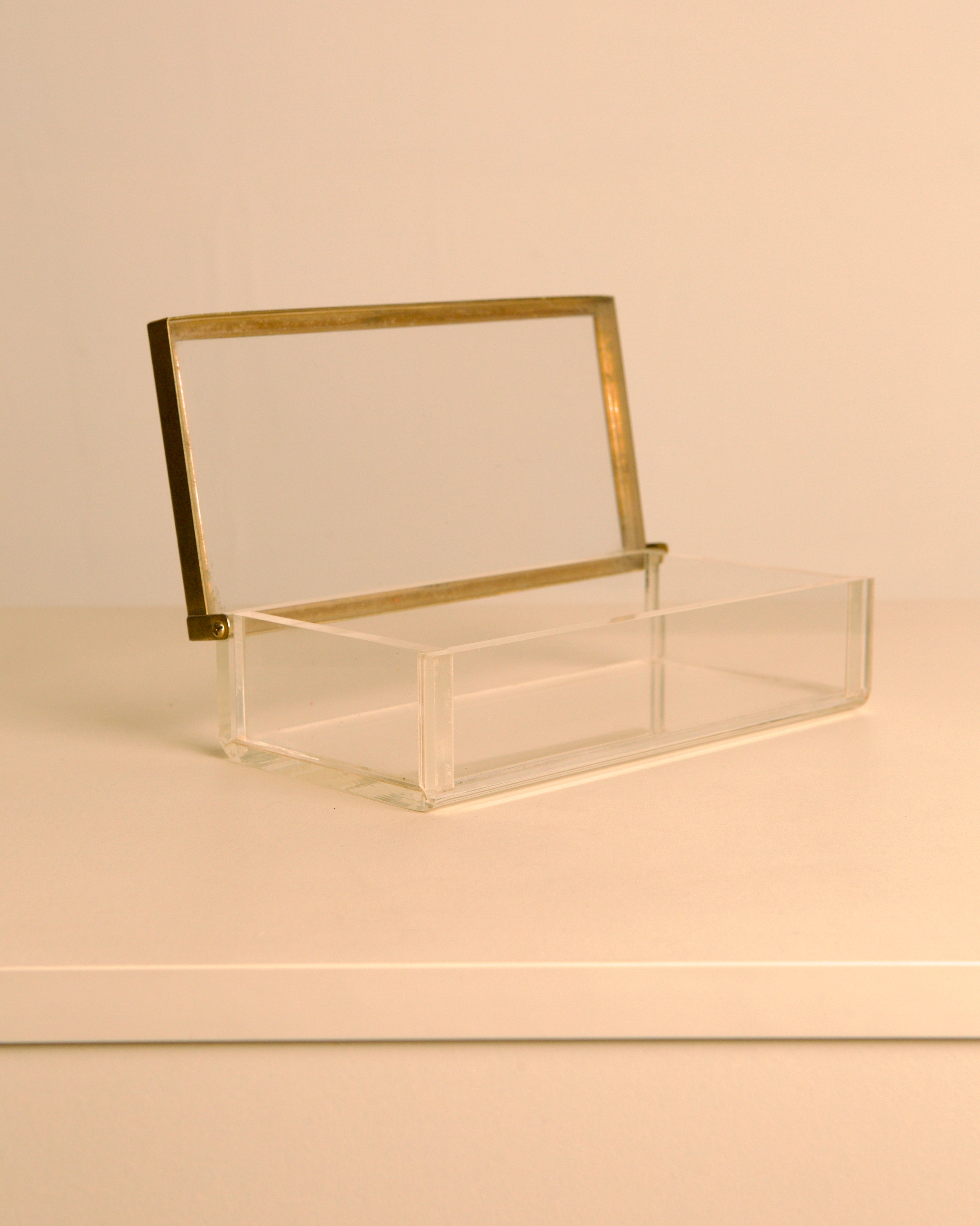 talian rectangular plexiglass box with metal trim, 1970s — close-up