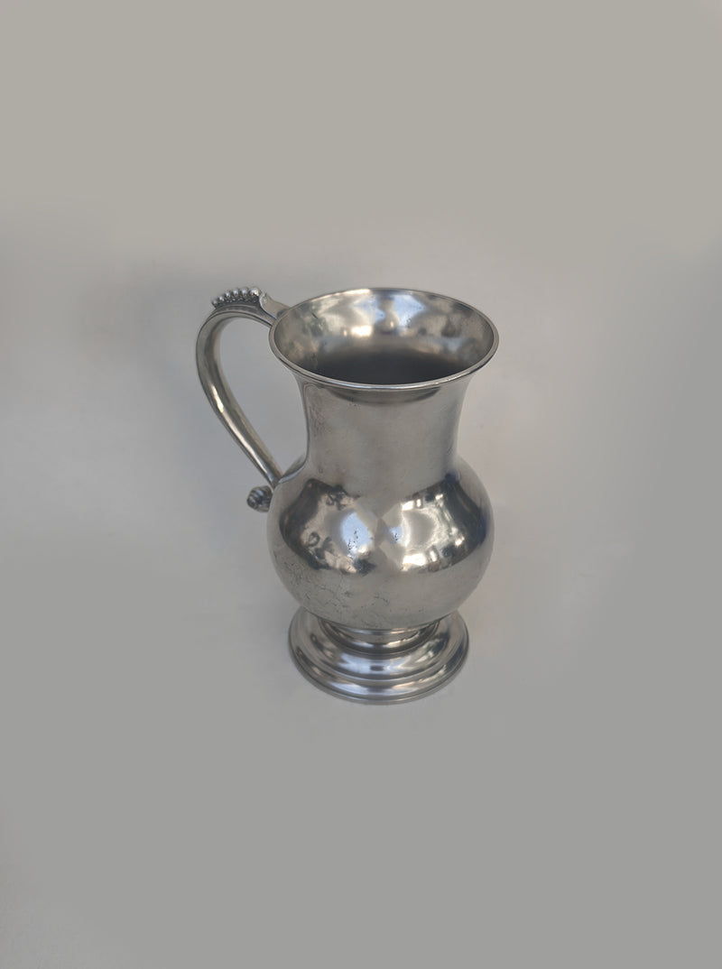 Small Pewter Pitcher — close-up showing polished metal surface