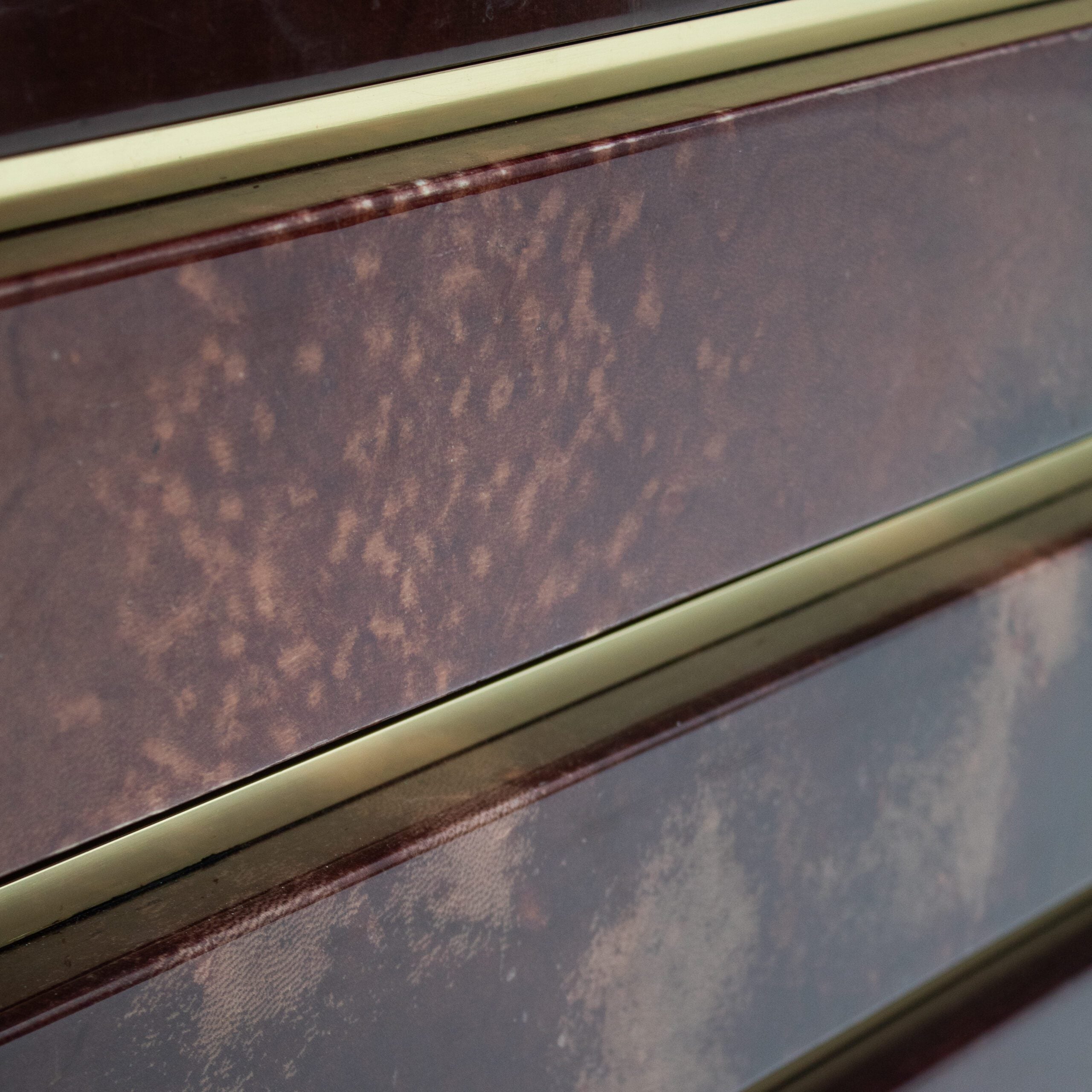 Pair of Aldo Tura (attr) Nightstands in Parchment and Brass — close-up of textured parchment surface