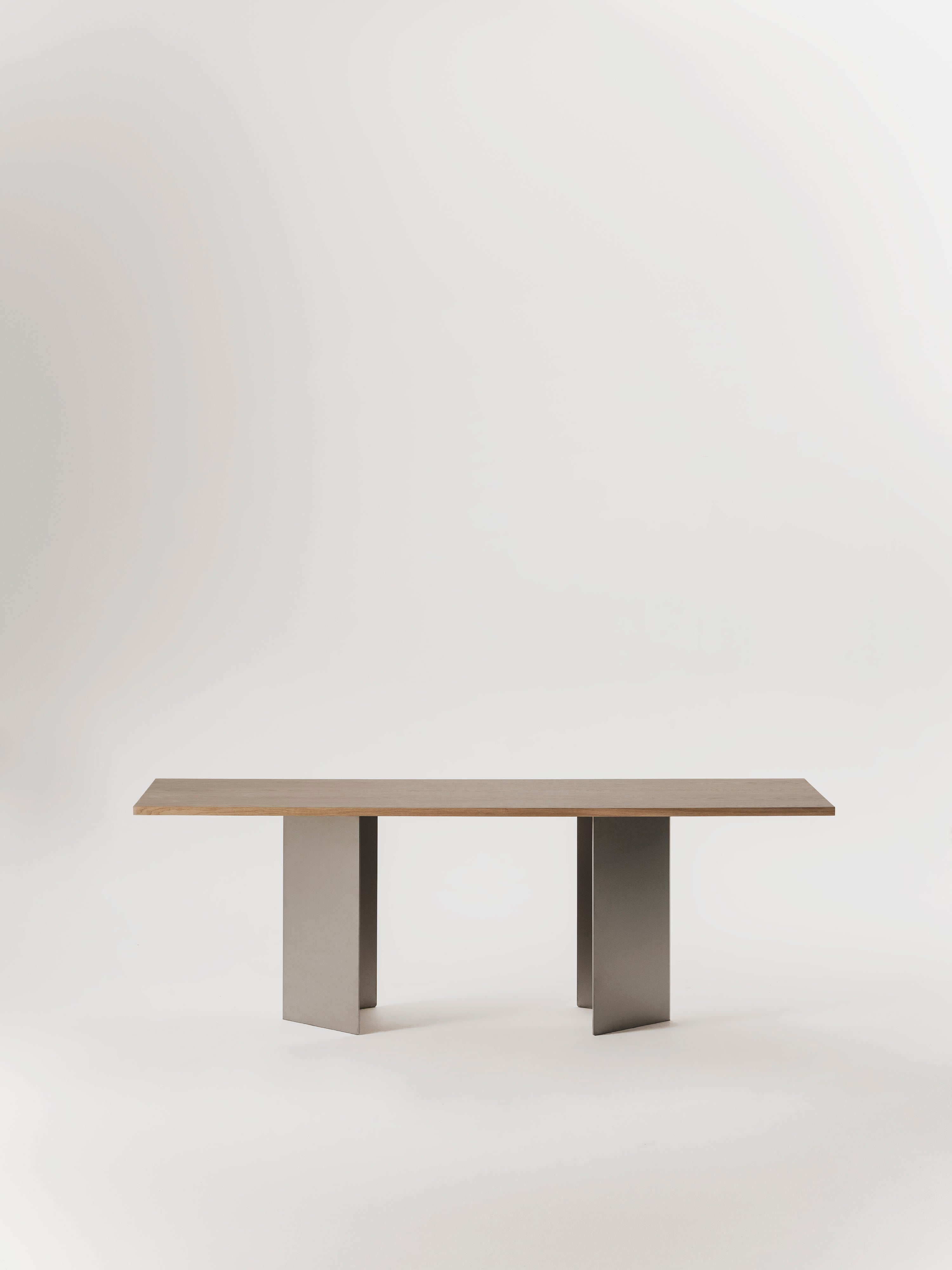Ander dining table — front view with light wood top and metal base