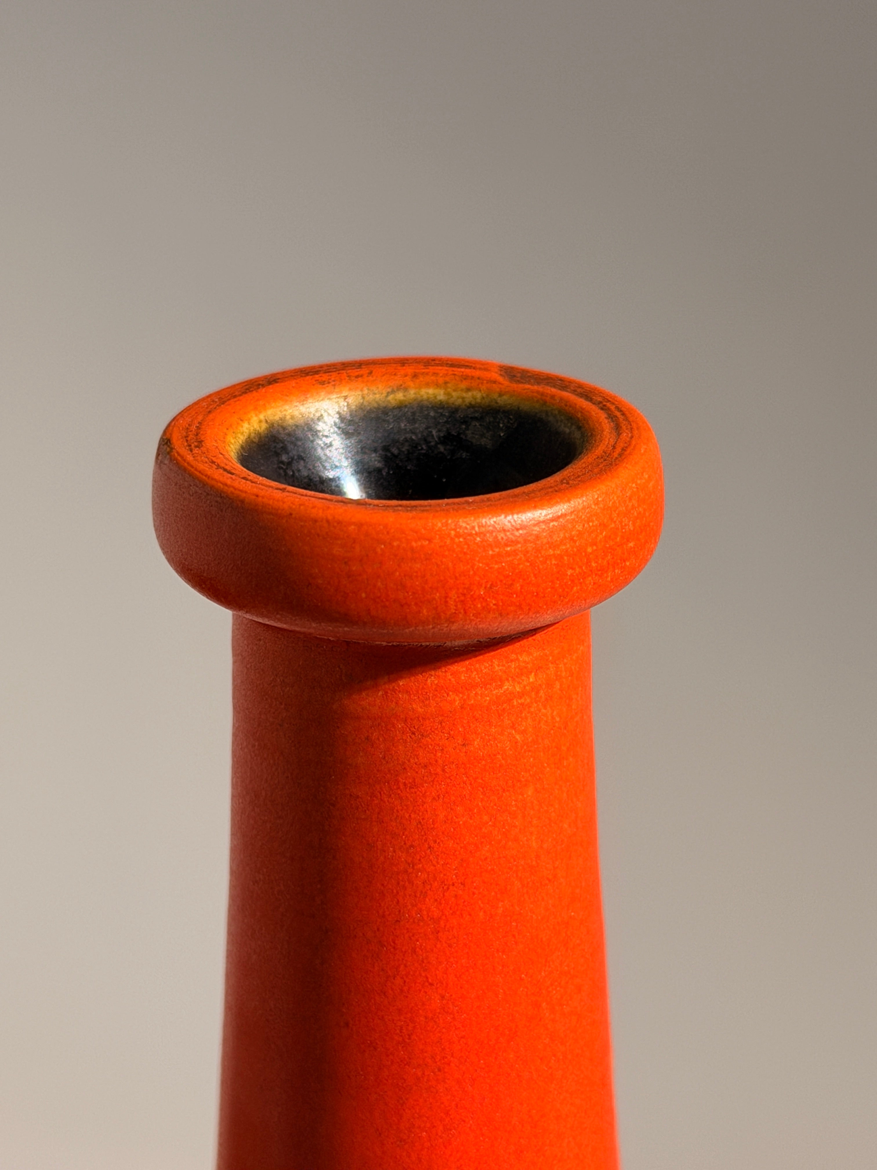 Large orange soliflore bottle vase by André-Jean Doucin, circa 1950 — side angle