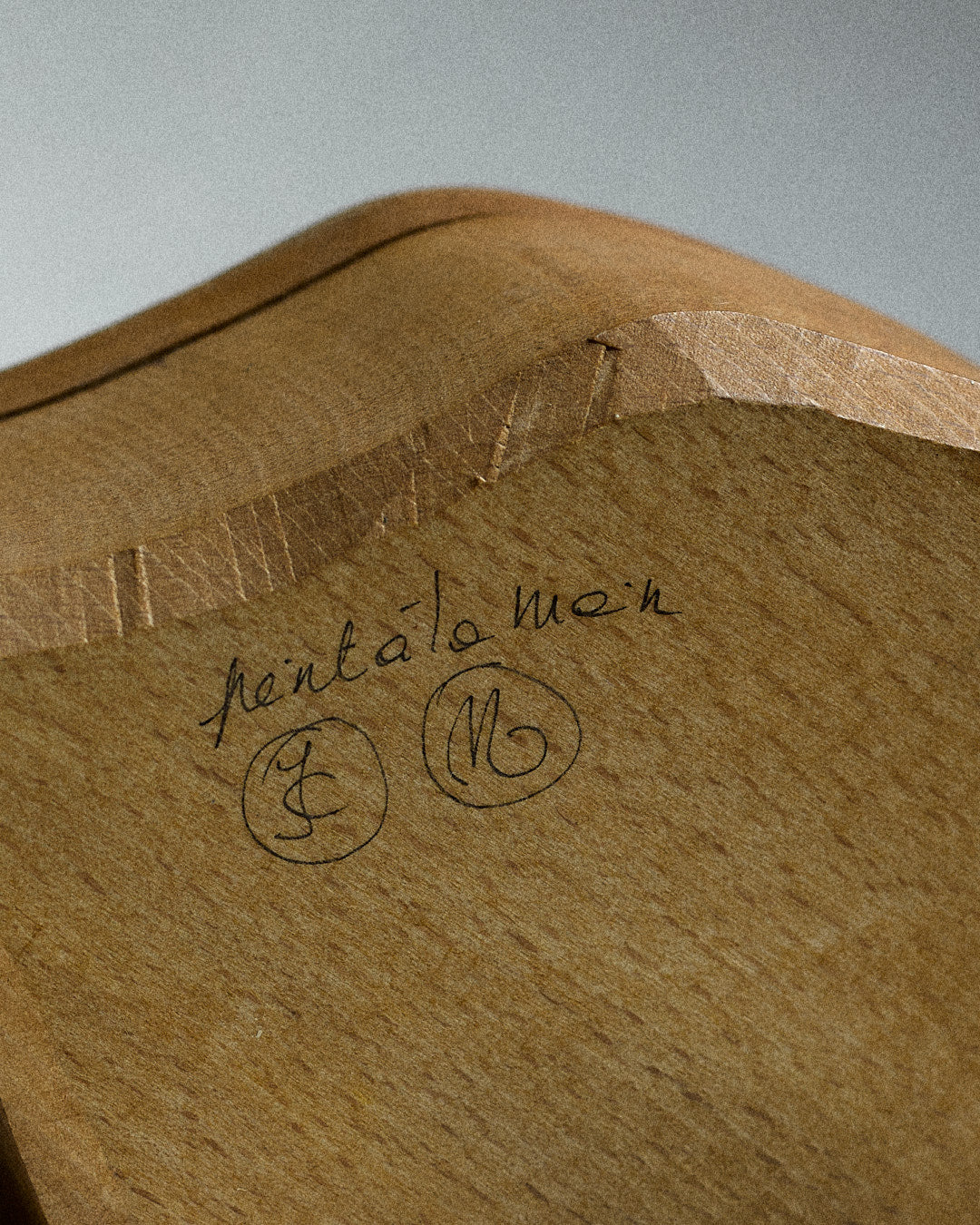 hand painted wooden box, fish — close-up of engraved signature on wood