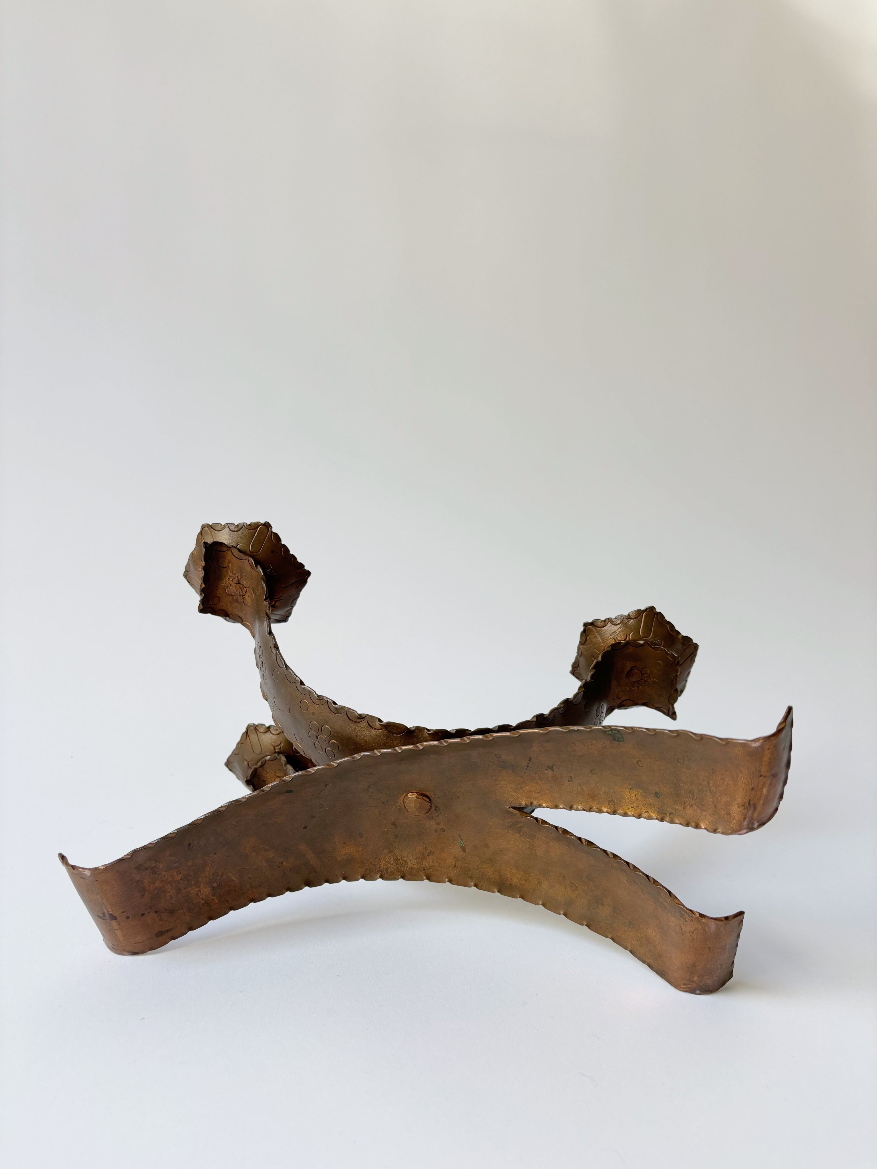 Large Metal Curved Artisan Candlestick, Poland — angled view on white background