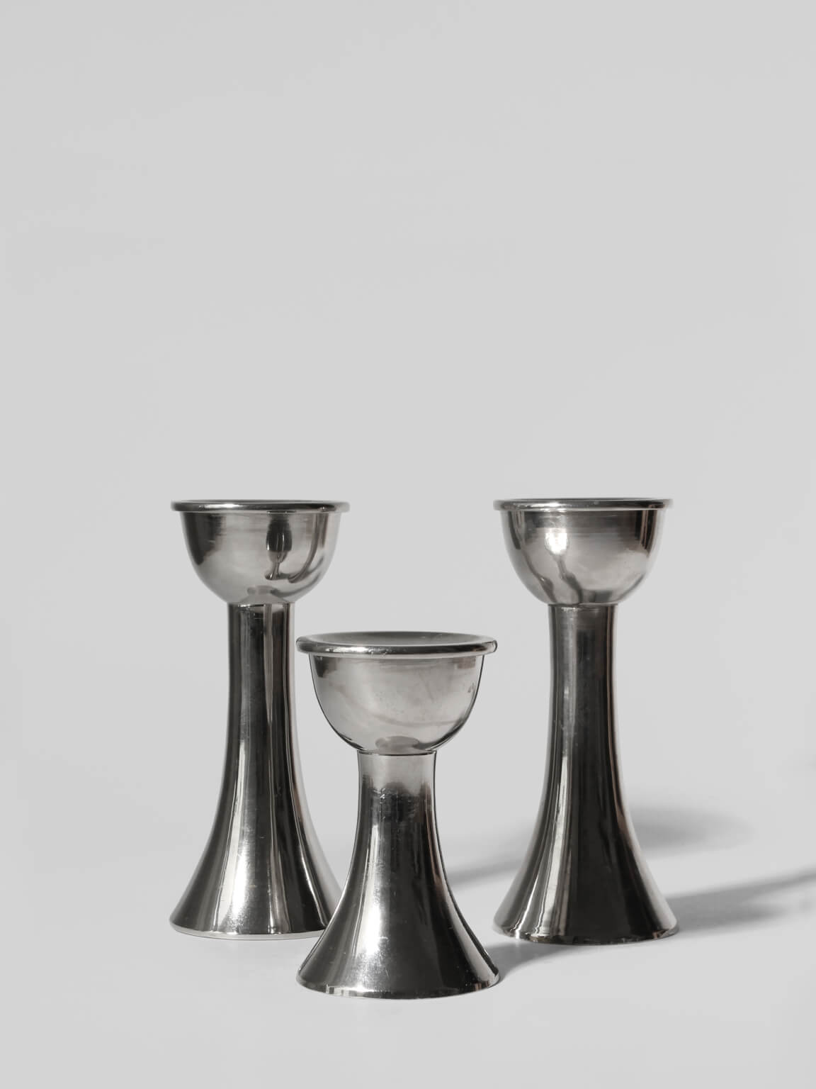 Mid-Century Silver Aluminum Candle Holders Set by Vintage Stories | The Oblist