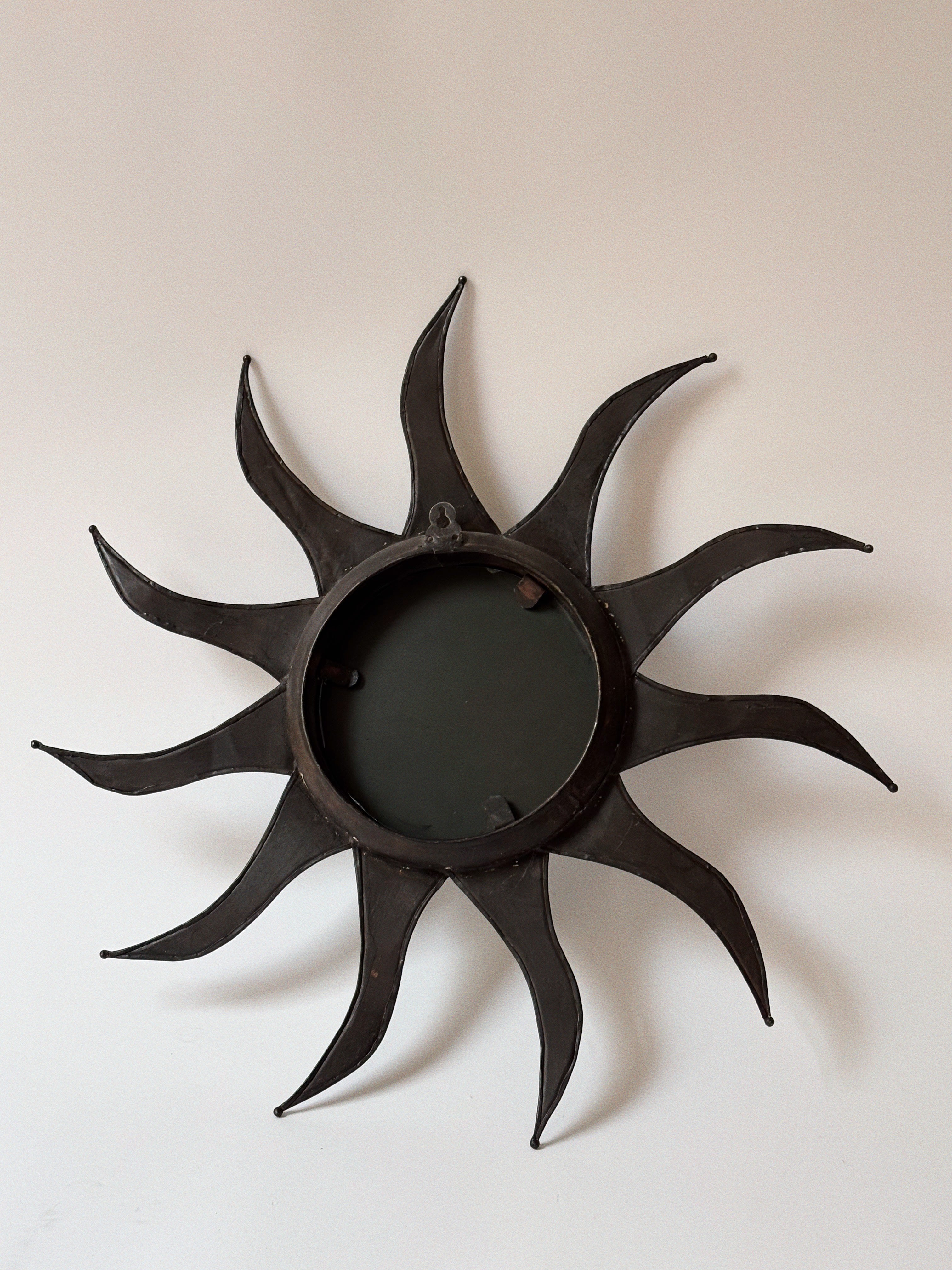 Artisan Metal Sun Mirror — lifestyle setting