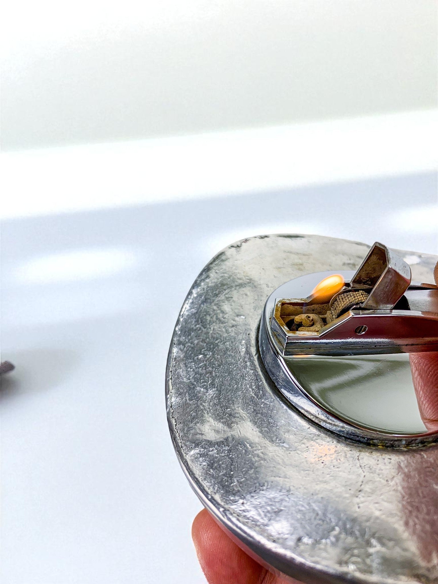 Brutalist Egg shaped lighter-ashtray by Ardisur, Bronze and aluminum, 1970's, Spain — close-up