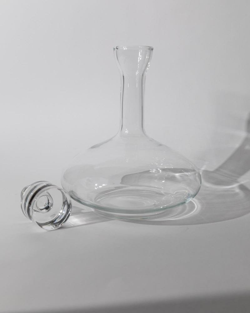 Vintage 1980s Glass Decanter, Italian Glass Ware with Glass Stopper — close-up of clear glass decanter with stopper