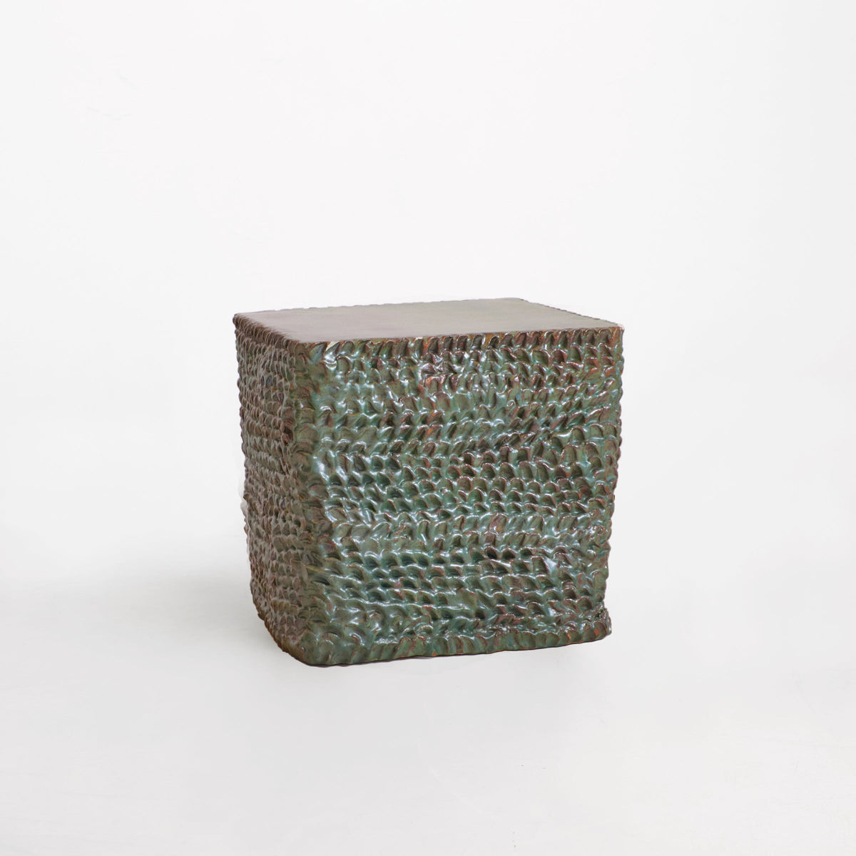 Casa - green textured ceramic side table — close-up