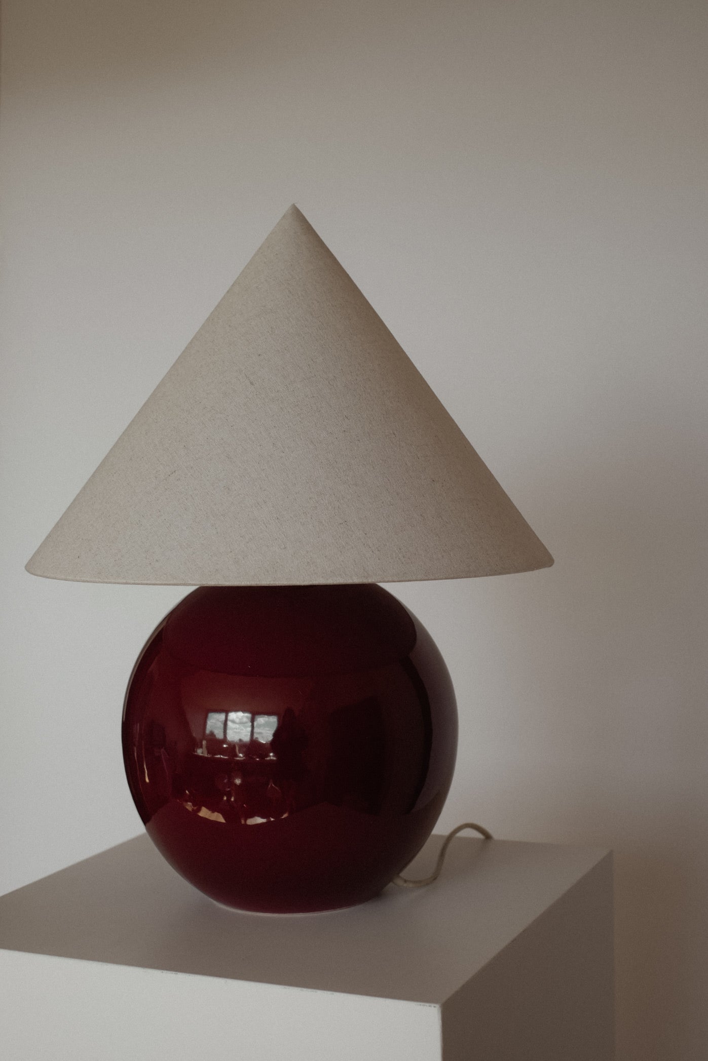 Burgundy & Linen Sculptural Table Lamp — close-up