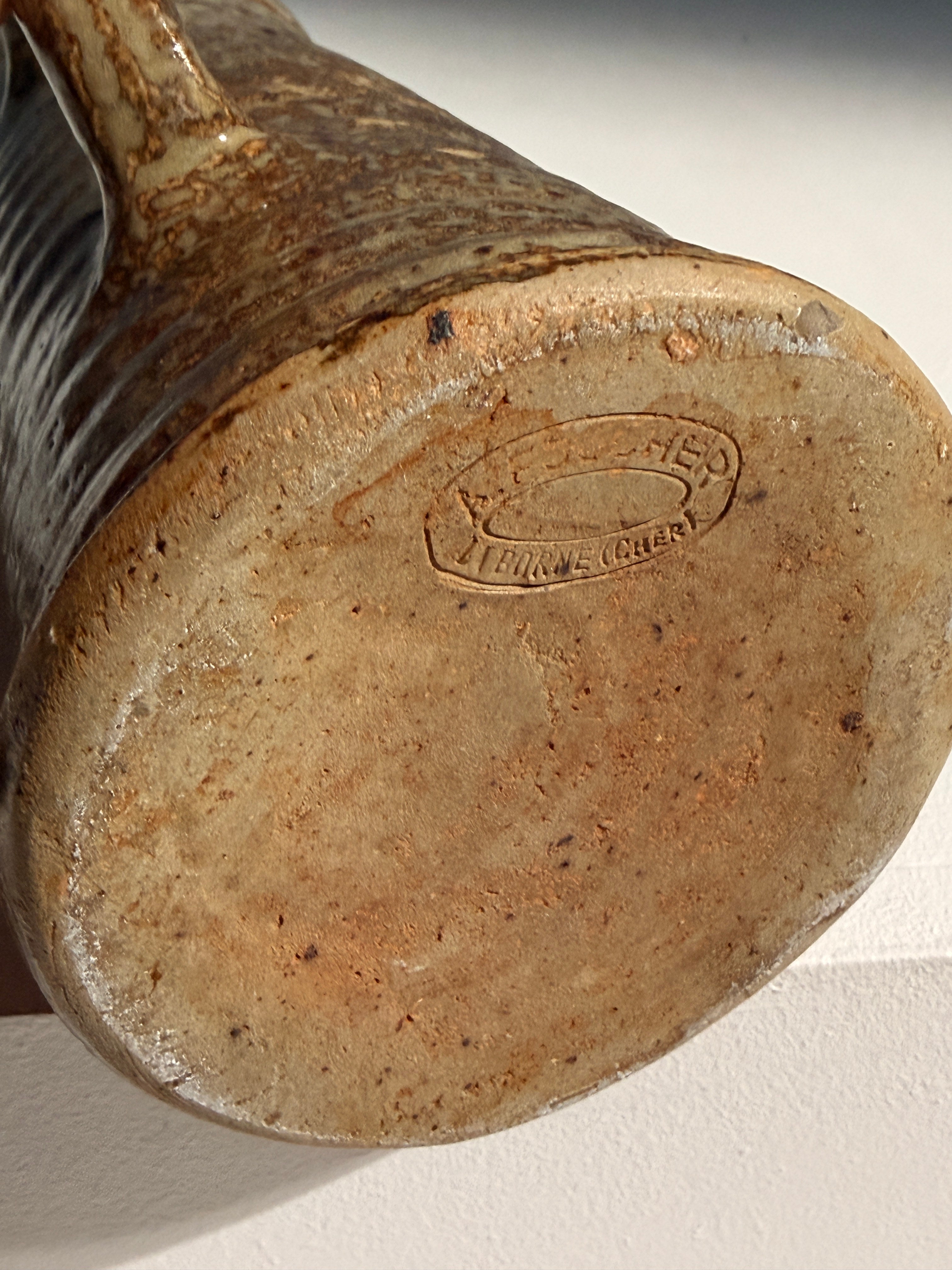 A sculptural collection of stoneware pitchers, France, 1960–1980 — side angle