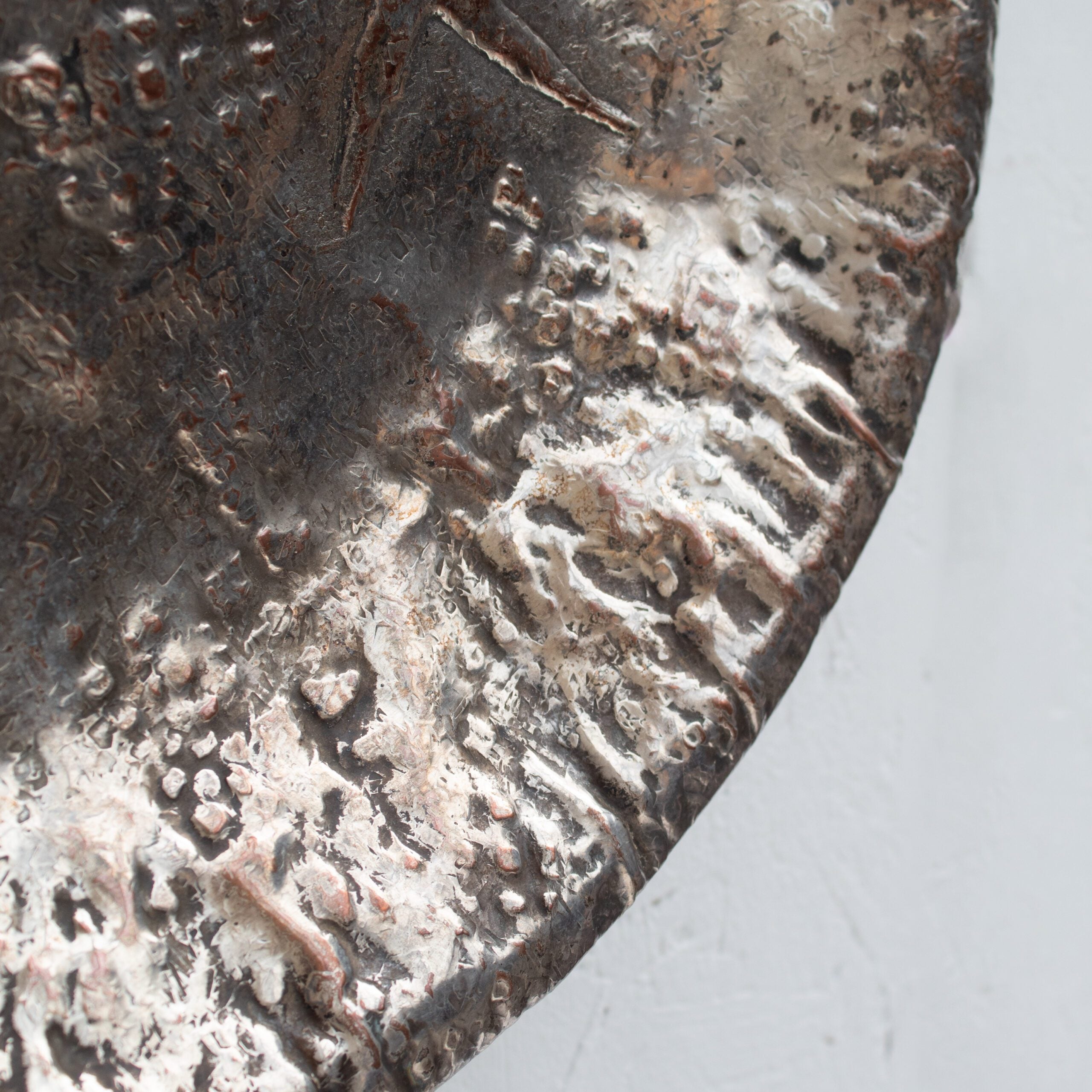 Bragalini Hammered Metal Wall Sculpture — lifestyle setting