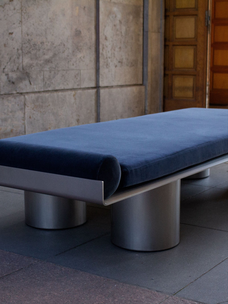 Monteverdi Daybed — close-up of navy velvet cushion and metal base