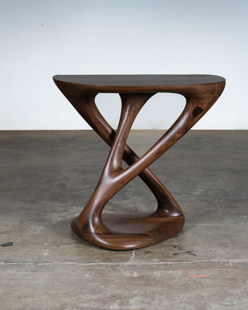 Kova Console in Walnut wood Natural Stain — side view highlighting curved wooden design
