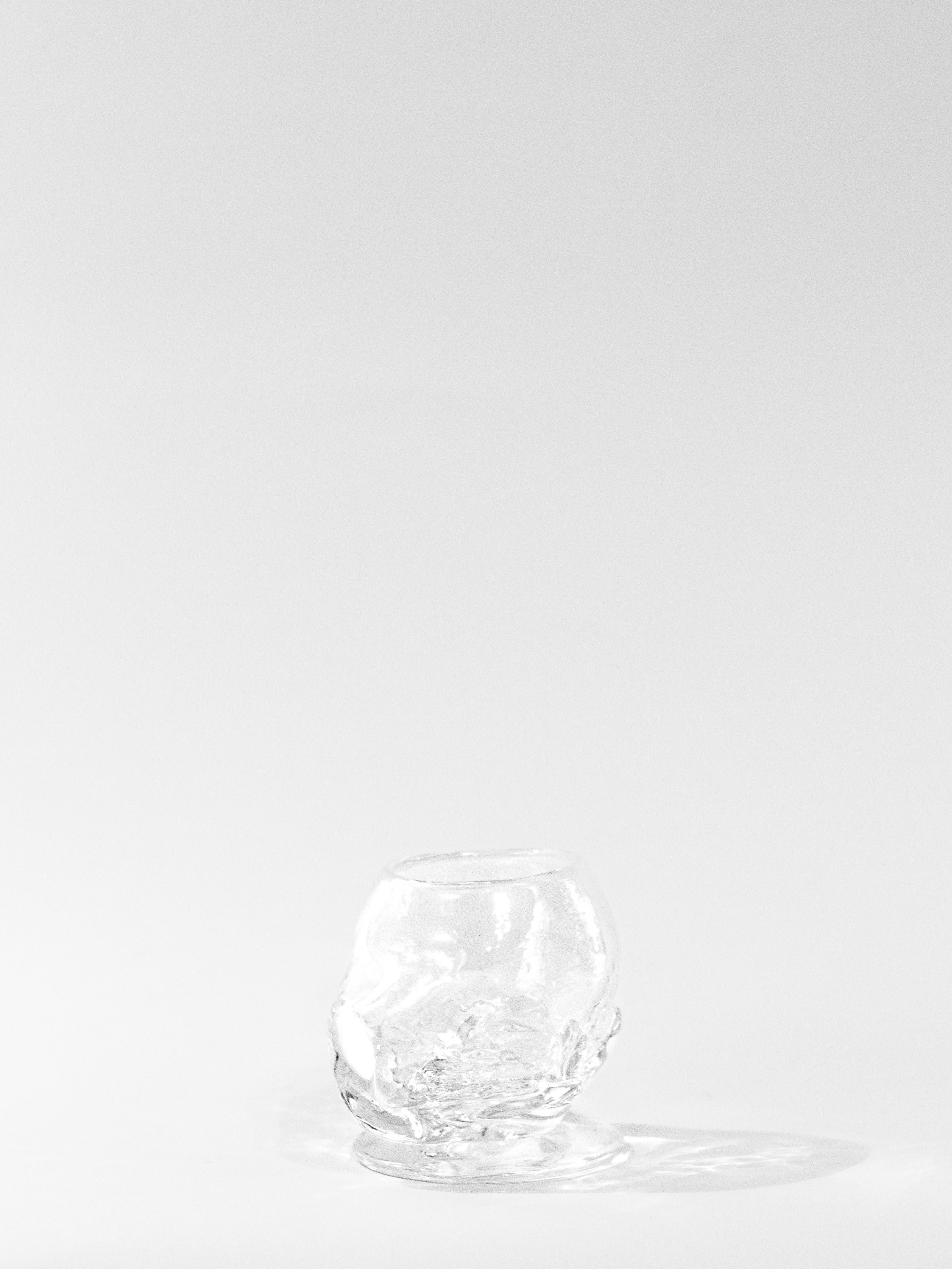 Organic Round Table Glass — back view showing clear glass texture