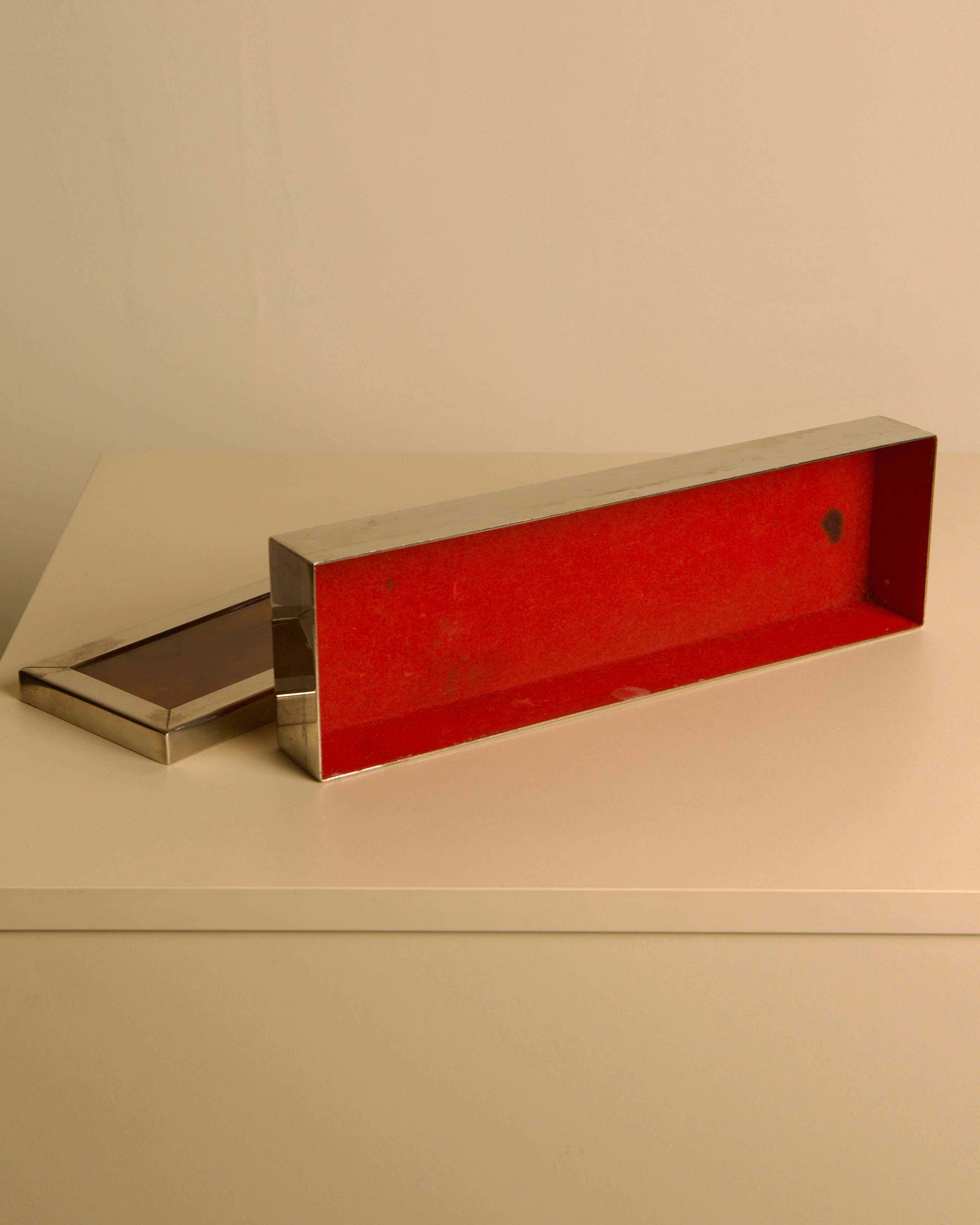 Rectangular Italian Metal Box, 70s — angled view with red interior on neutral surface