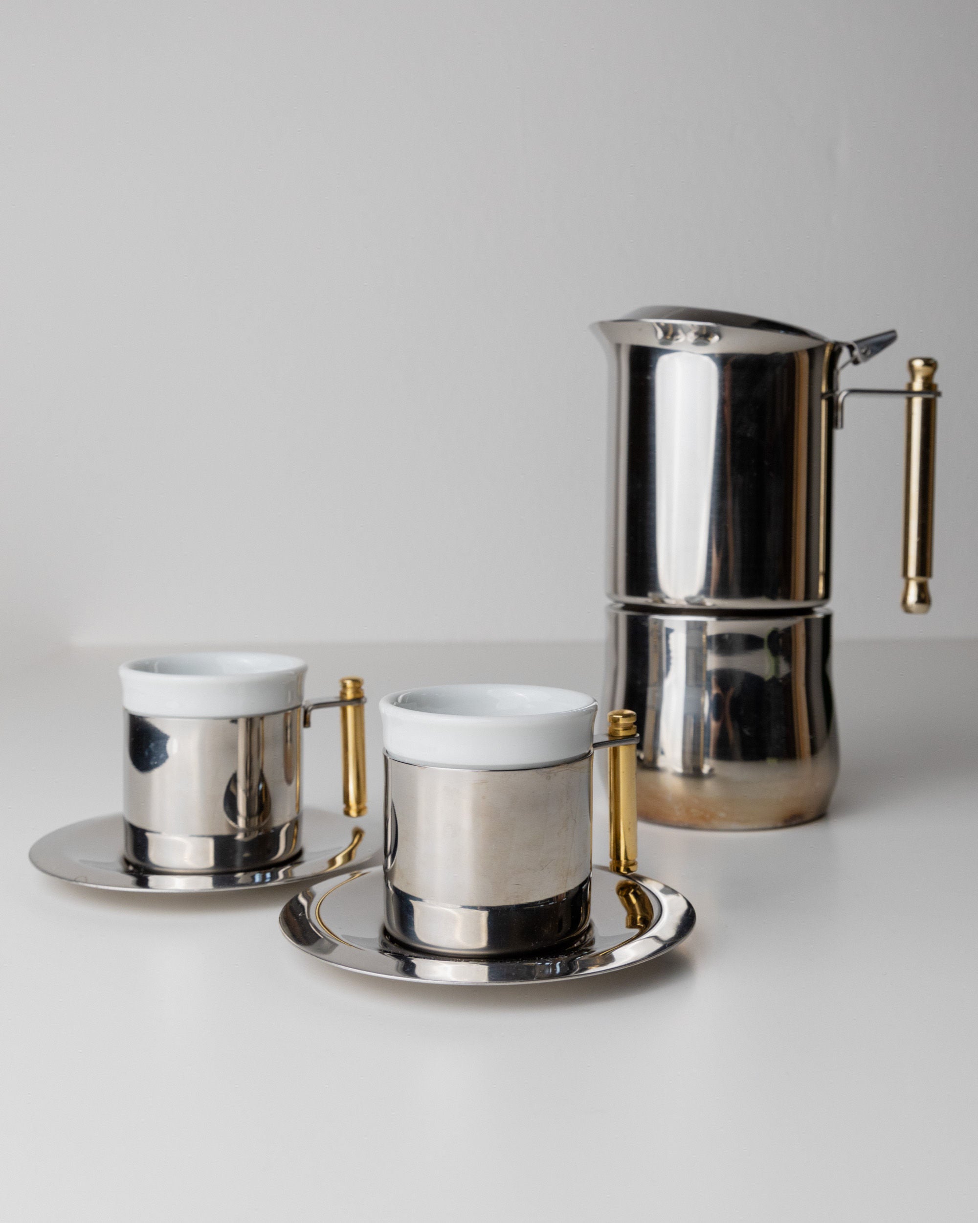 Coffee Set by IMCO, Italy 80s — close-up of polished metal and white ceramic