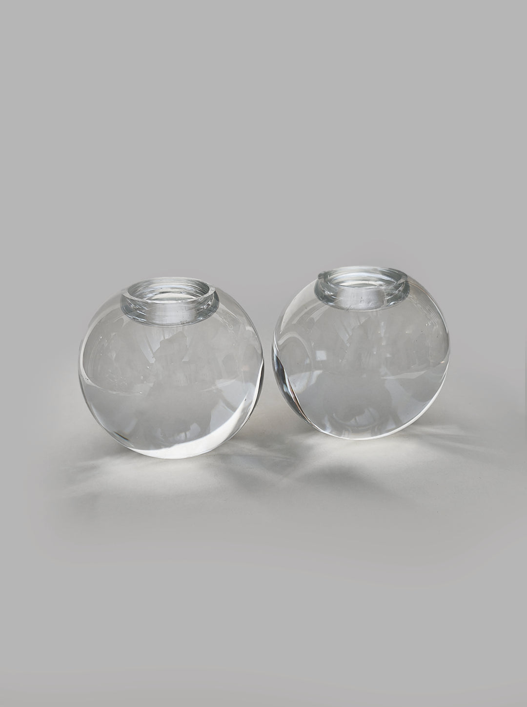 Crystal Spheric Candle Holders — close-up on clear glass surface