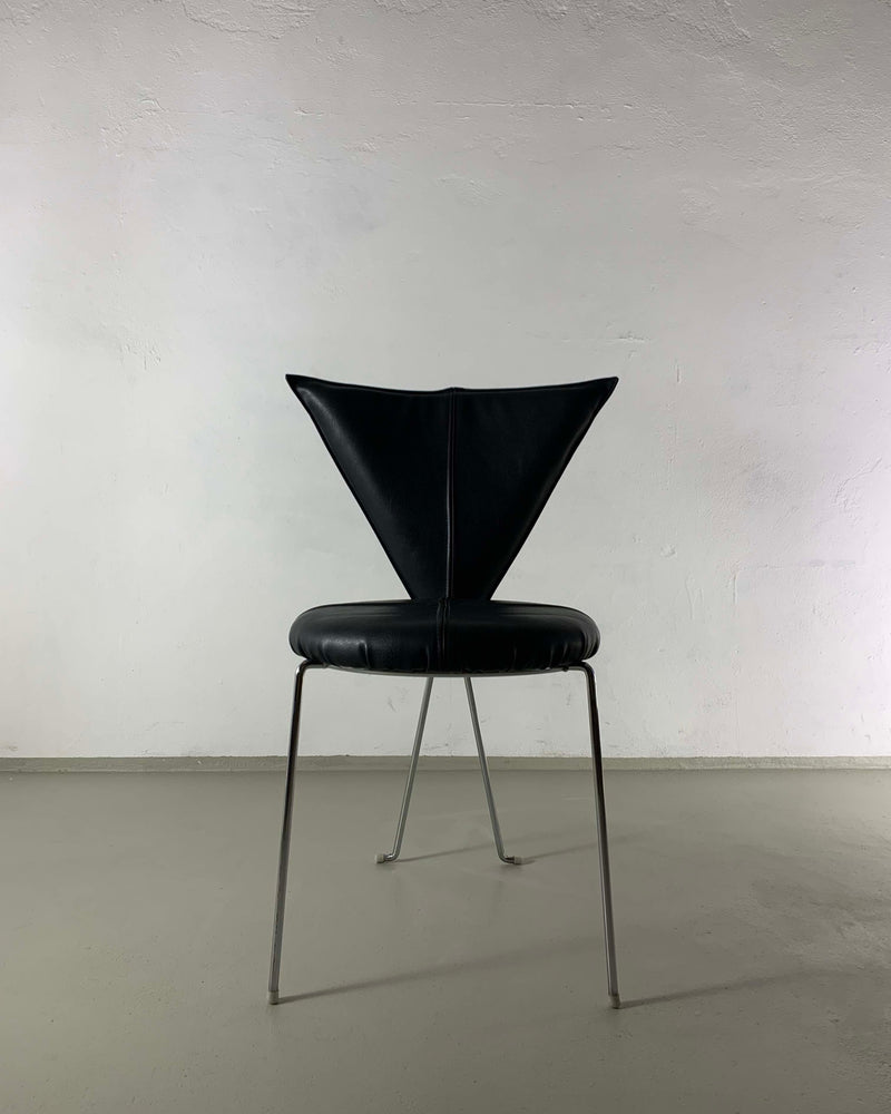 Black leatherette Lubke chair with triangular backrest on metal legs