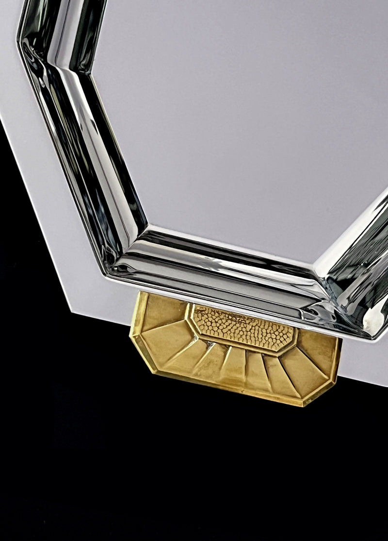 Brass corner detail of vintage stainless steel serving dish